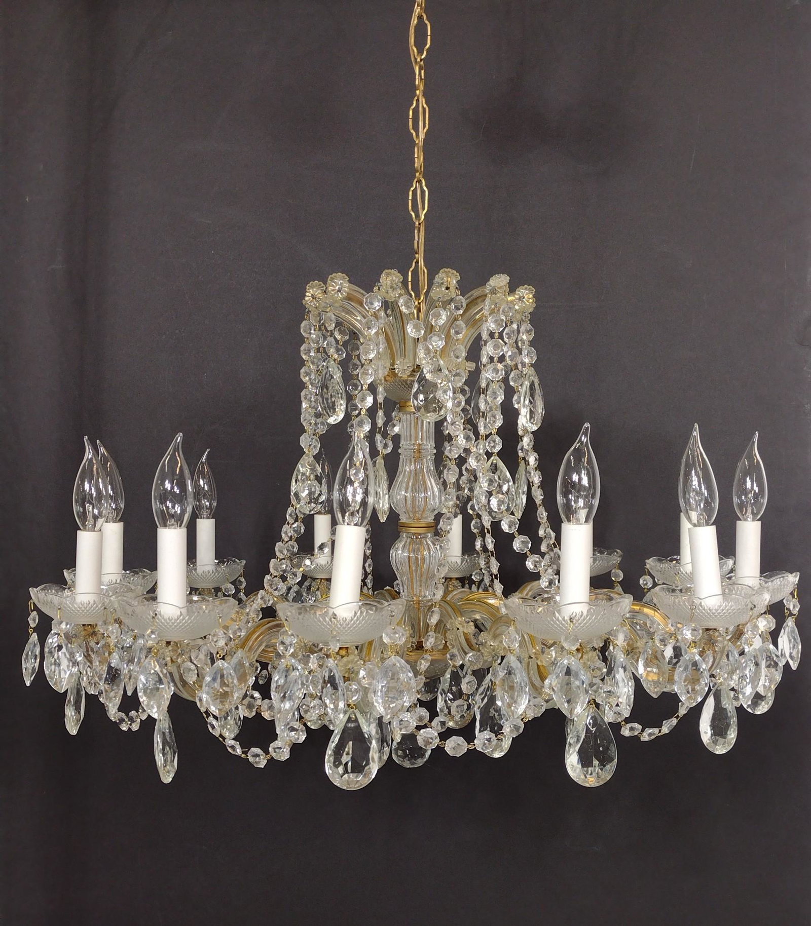 Crystal Chandelier: Working. Has all crystals. No manufacturers name found. 30" diameter X 21" high. MG. IMPORTANT: Before bidding, please read the terms and conditions. When you registered for the auction you agreed to 