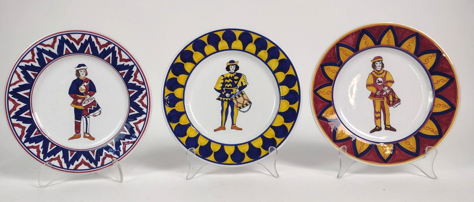 3 Deruta Drummer Cabinet Plates: Each 8-1/2" in diameter. EL From the estate of Robert Harman. IMPORTANT: Before bidding, please read the terms and conditions. When you registered for the auction you agreed to these terms and will be
