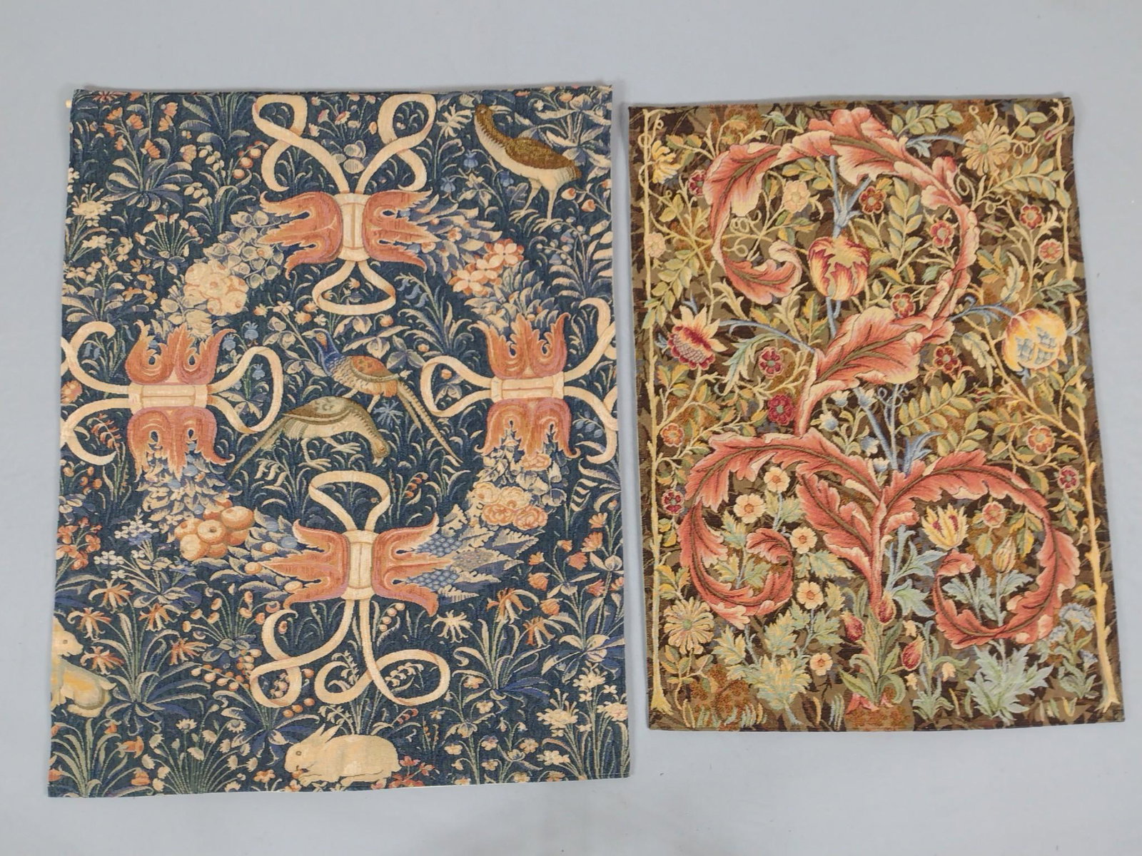 2 Museum of Modern Art Tapestries: Blue 42" long X 33" wide. Flowers 39" long X 28" wide. MG. From the estate of Robert Harman. IMPORTANT: Before bidding, please read the terms and conditions. When you registered for the auction you ag