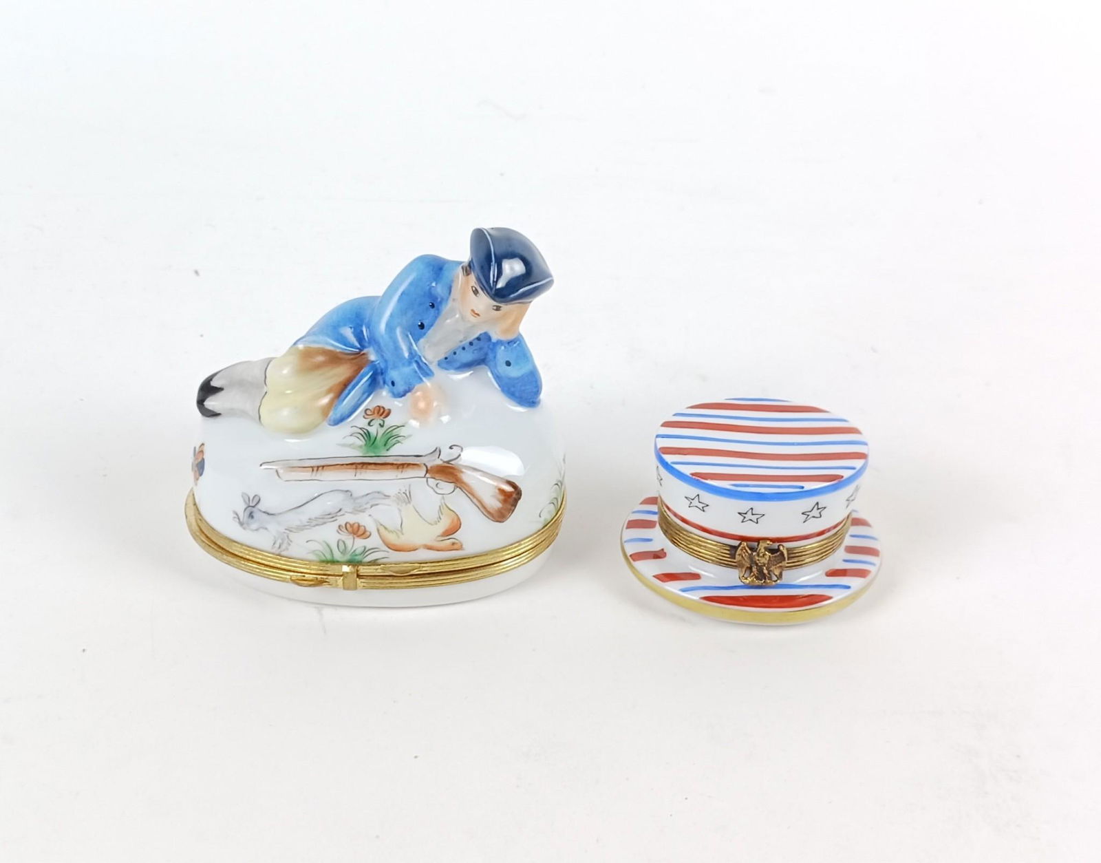 2 Limoges Trinket Boxes incl Hat: Made of porcelain. Also includes colonial man with long rifle. 1-1/4" to 3-1/4" high. MEG From the estate of Robert Harman. IMPORTANT: Before bidding, please read the terms and conditions. When you re