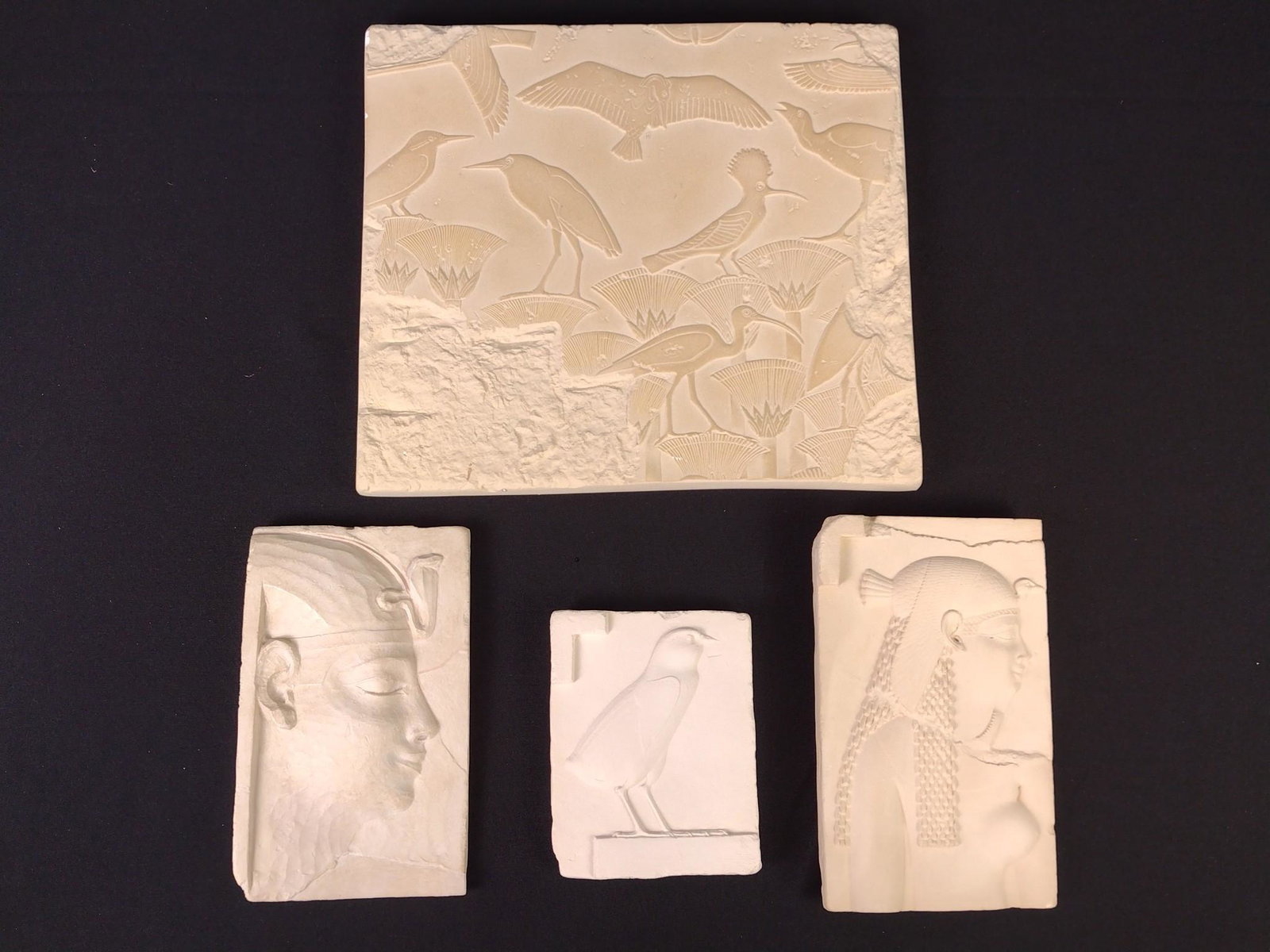 4 MMA Egyptian Style Museum Plaques: All from The Metropolitan Museum Of Fine Art. 4" to 11" wide X 5" to 10" high. MG. From the estate of Robert Harman. IMPORTANT: Before bidding, please read the terms and conditions. When you registere