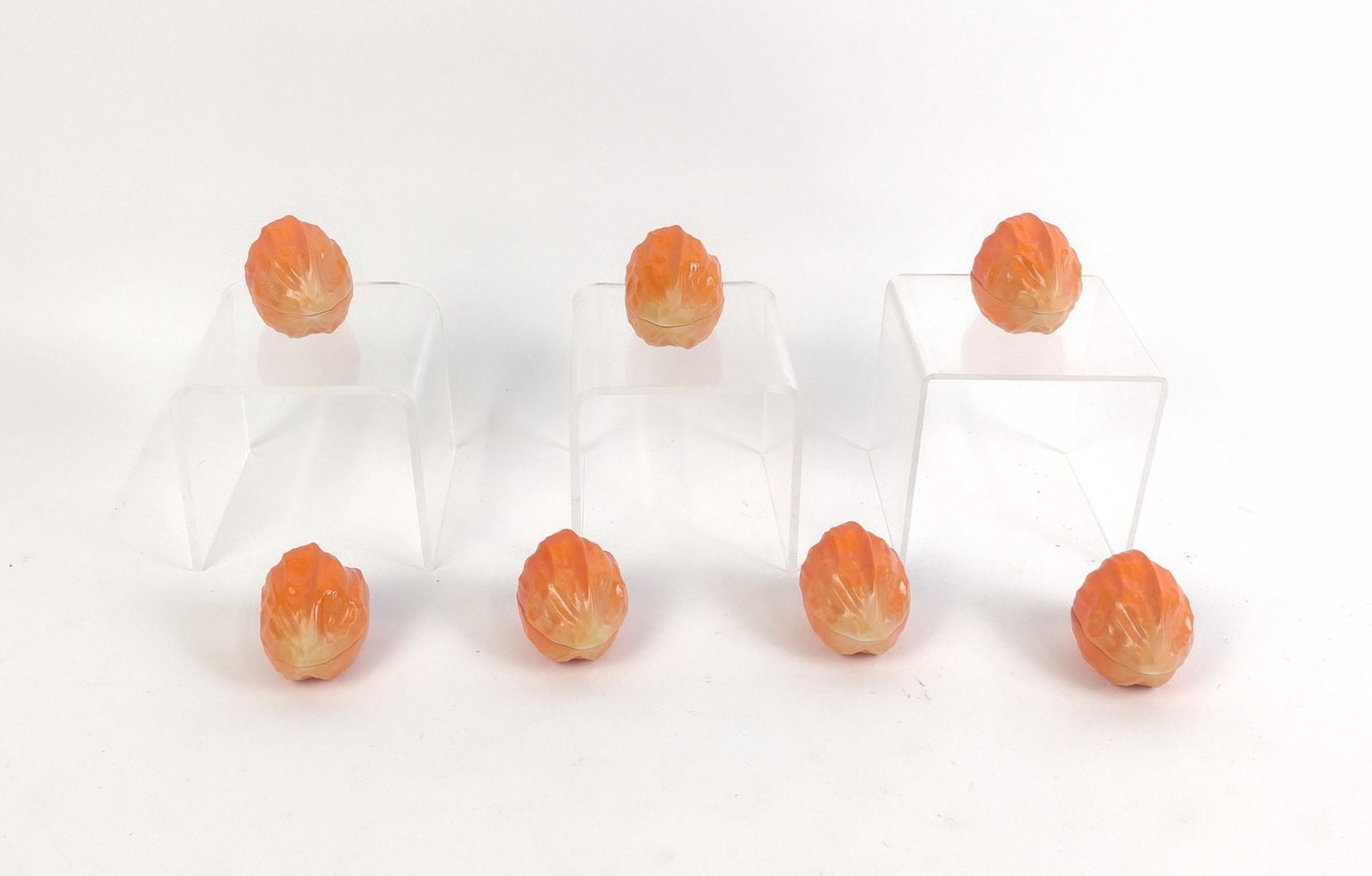 7 Walnut Trinket Boxes: All unmarked. Bright orange in color. Each 2" wide X 2-1/2" deep X 1-3/4" high. MEG From the estate of Robert Harman. IMPORTANT: Before bidding, please read the terms and conditions. When you register