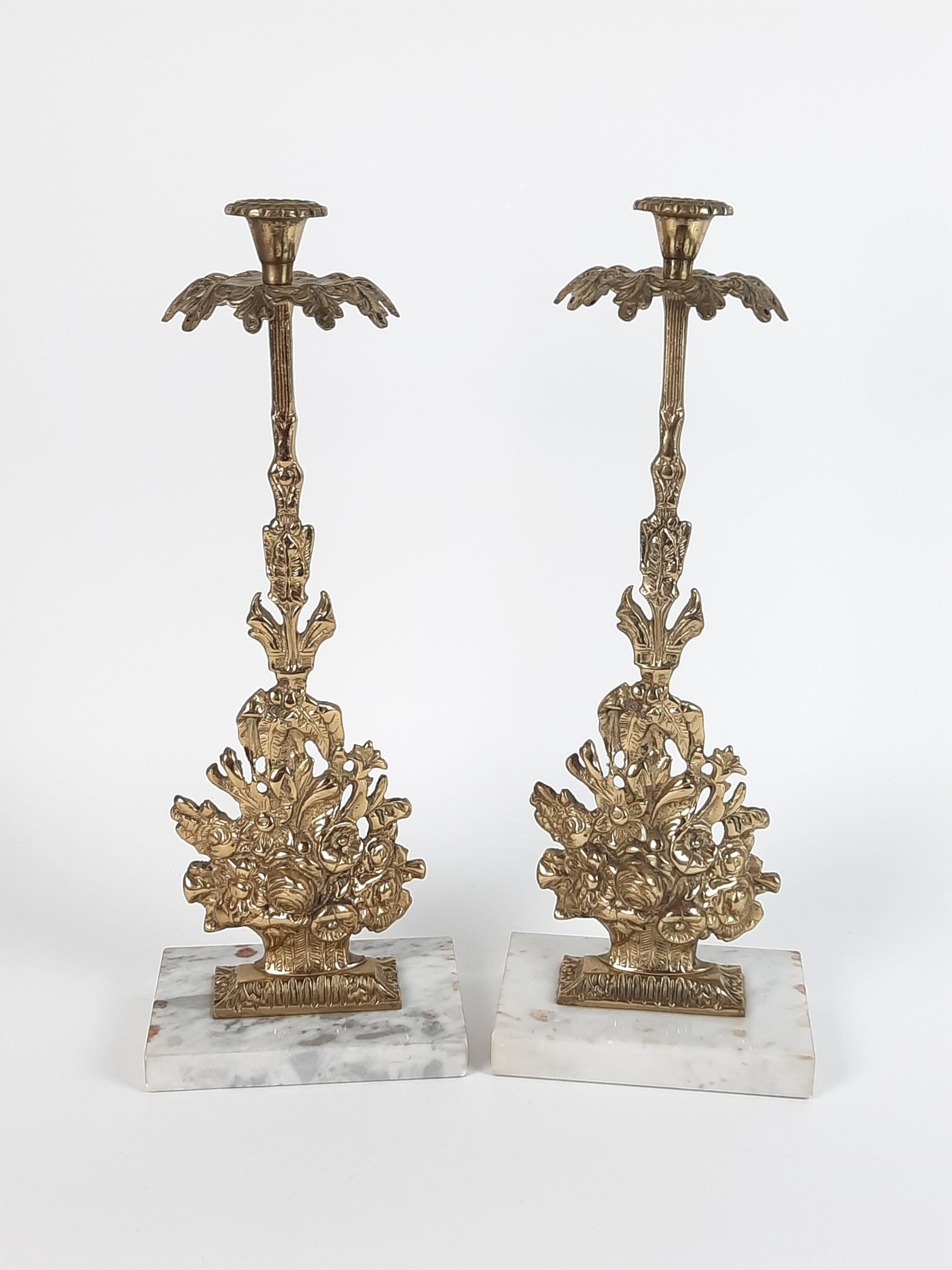 Pair Brass and Marble Candle Holders: Each 6" wide x 4" deep x 16" high. No prisms. Each candle holder should hold 10 prisms. LR IMPORTANT: Before bidding, please read the terms and conditions. When you registered for the auction you agre