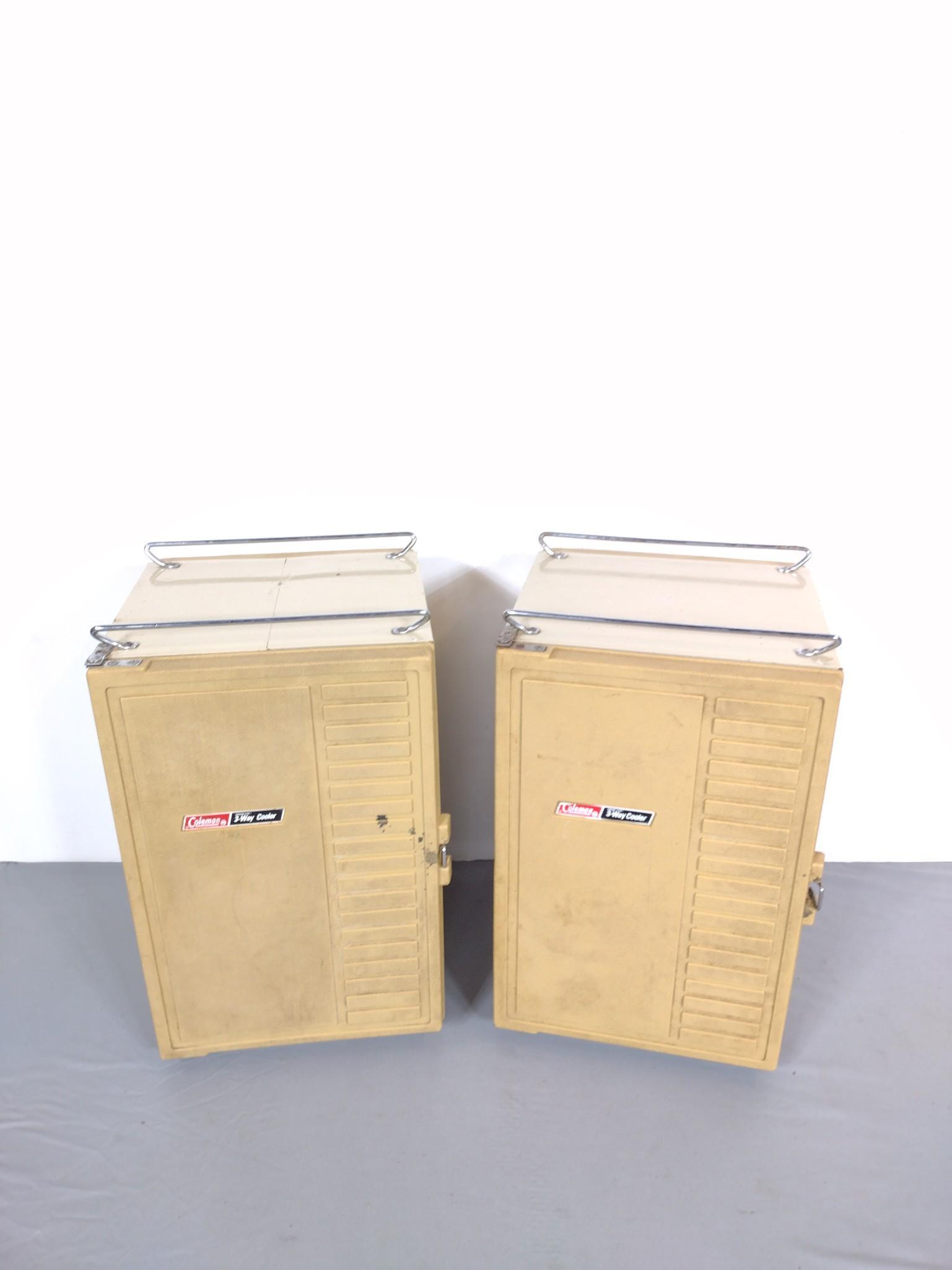 2 Coleman Snow-Lite 3-Way Coolers: Each 16" wide X 16" deep X 26-1/2" high. Both have some discoloring. MG. IMPORTANT: Before bidding, please read the terms and conditions. When you registered for the auction you agreed to these terms 