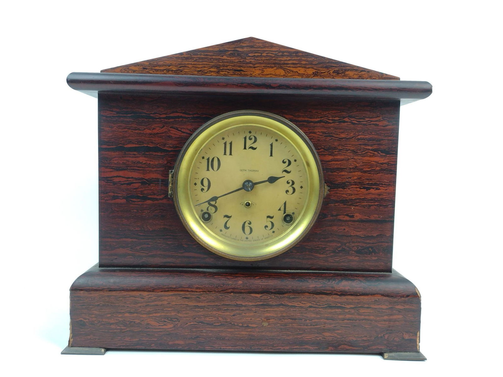 Seth Thomas Mantel Clock: Starts and stops. 13" wide X 6" deep X 11-1/2" high. MG. IMPORTANT: Before bidding, please read the terms and conditions. When you registered for the auction you agreed to these terms and will be requ
