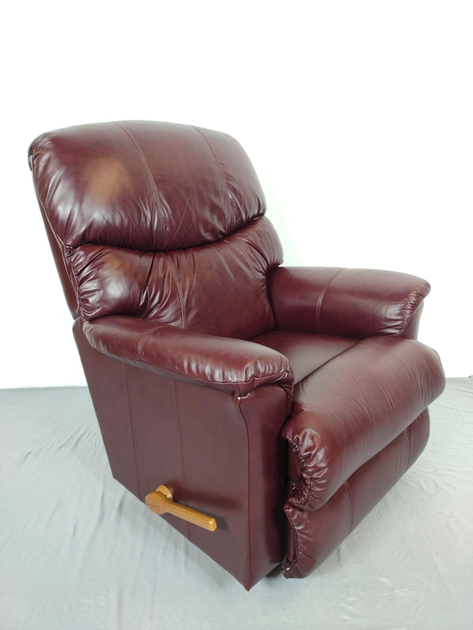 La-Z-Boy Leather Recliner Chair: 36" wide X 34" deep X 41-1/2" high. MG. IMPORTANT: Before bidding, please read the terms and conditions. When you registered for the auction you agreed to these terms and will be required to comply wi