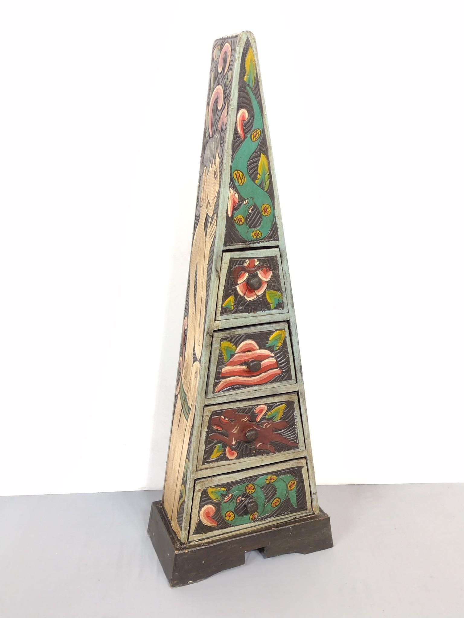 Bali Carved Pyramid Chest with 4 Drawers: 13-1/2" wide X 7-1/2" deep X 39" high. Has some light scratches. MG. IMPORTANT: Before bidding, please read the terms and conditions. When you registered for the auction you agreed to these terms and 