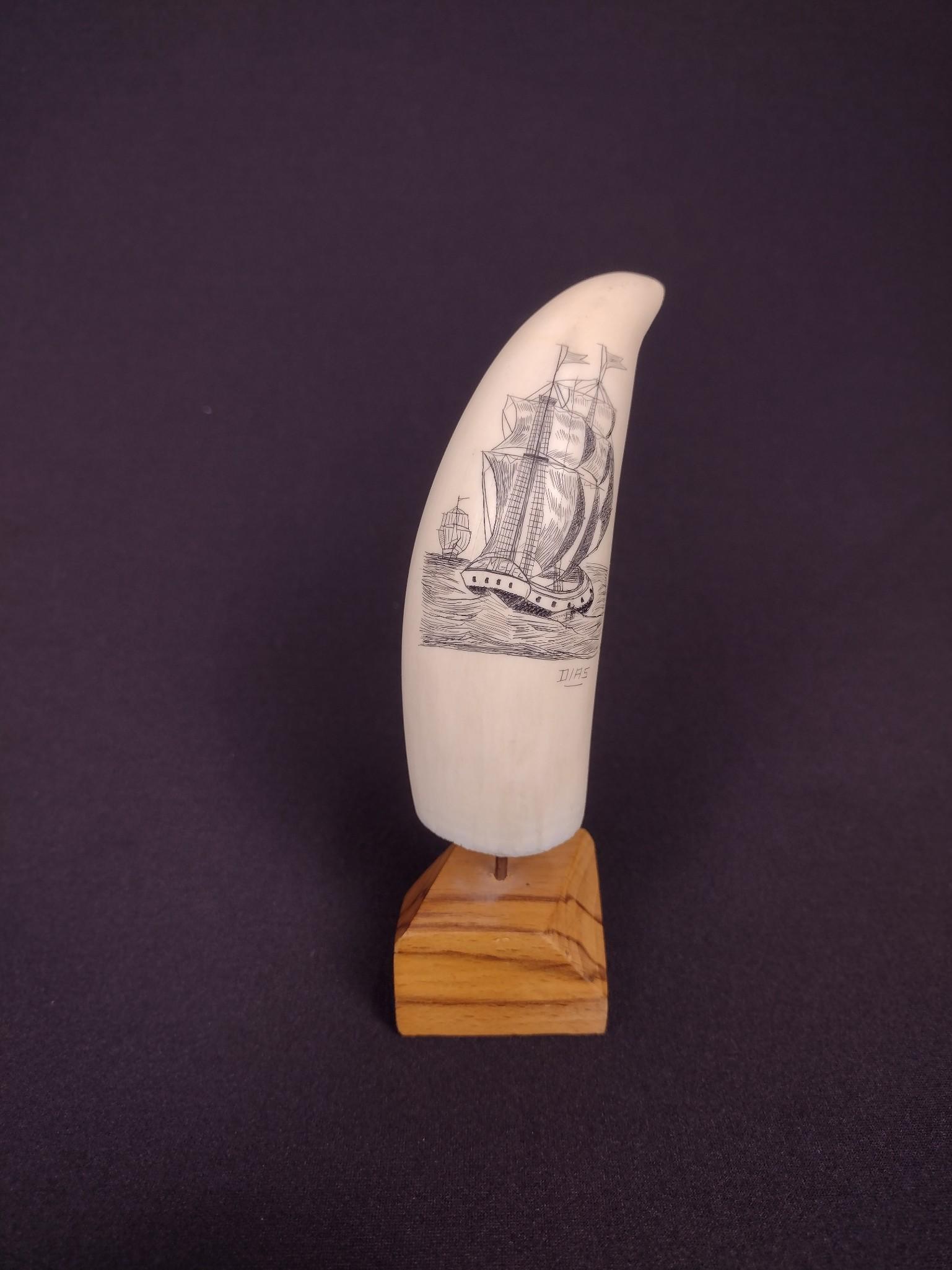 Dias Signed Schrimshaw Tooth: 1-3/4" wide X 2-1/4" deep X 5" high. EL IMPORTANT: Before bidding, please read the terms and conditions. When you registered for the auction you agreed to these terms and will be required to comply wi