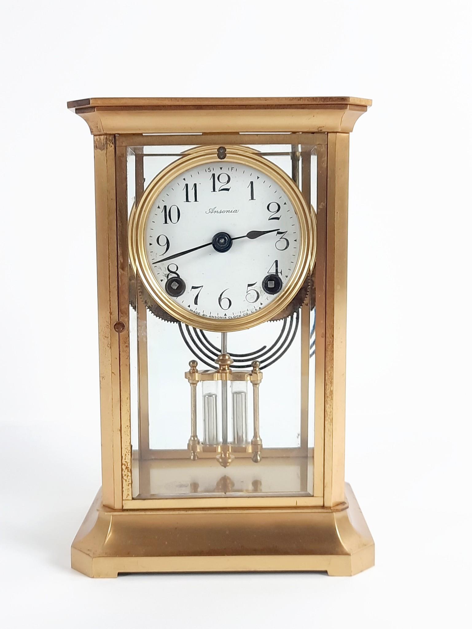 Ansonia Clock Co Crystal Regular Clock: Working. Has key. 6" wide x 4-3/4" deep x 9-1/4" high. Some finish loss to case. LR IMPORTANT: Before bidding, please read the terms and conditions. When you registered for the auction you agreed to t
