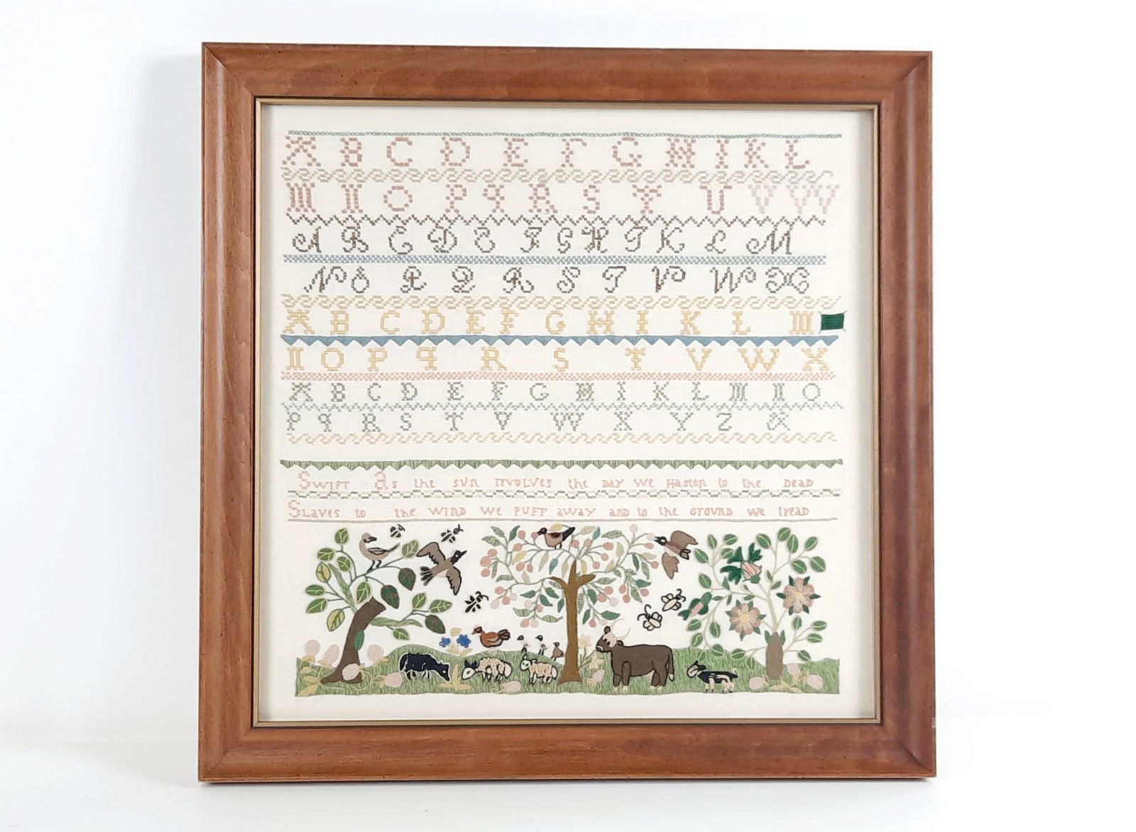 Swift As The Sun Revolves Needlepoint Sampler: Overall with frame 21" high x 21" wide. LR IMPORTANT: Before bidding, please read the terms and conditions. When you registered for the auction you agreed to these terms and will be required to comply