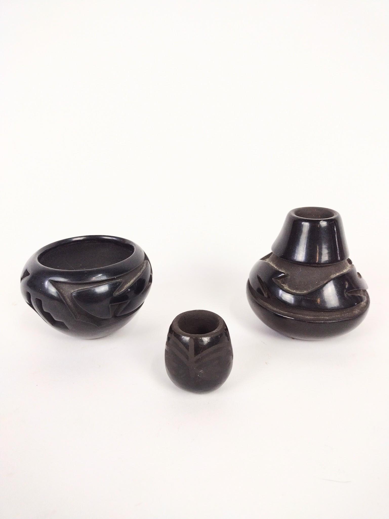 3 Pcs Santa Clara Pottery: Includes 1. Anthony Baca. Santa Clara. 2. Carol Velarde. Santa Clara. 3. Birdell Bourdon. Santa Clara Pueblo. 1-1/4" to 3" diameter X 1-1/2" to 3-1/4" high. EL IMPORTANT: Before bidding, please read t