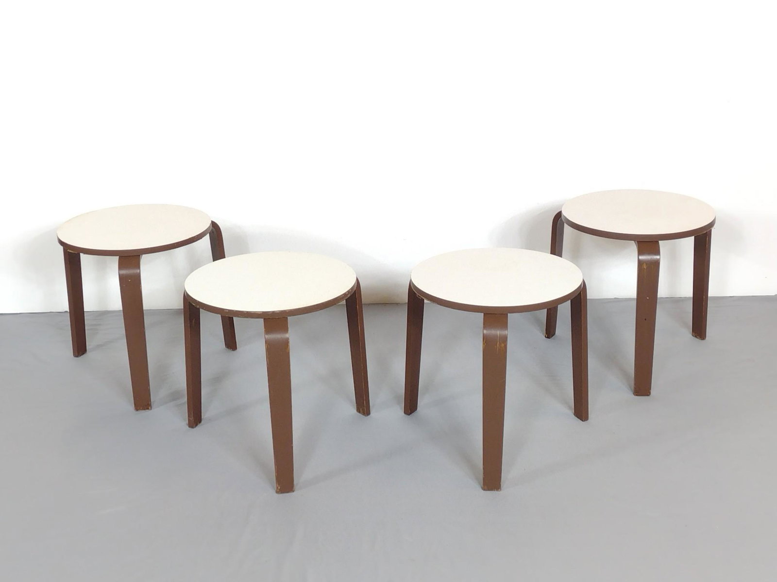 4 Stackable Round Side Tables: Each 16" diameter X 15-3/4" high. All have some scratches and slight discoloring to tops. No manufactures name found. MG. IMPORTANT: Before bidding, please read the terms and conditions. When you regi