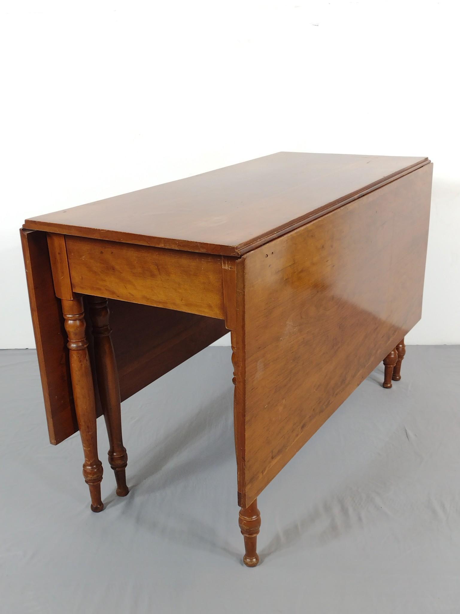 Drop Leaf Table: Open 60-1/2", closed 21-1/4" wide X 46" deep X 29" high. Has scratches and a few spots of water damage on top. Legs have scratches and finish loss. MG. IMPORTANT: Before bidding, please read the terms