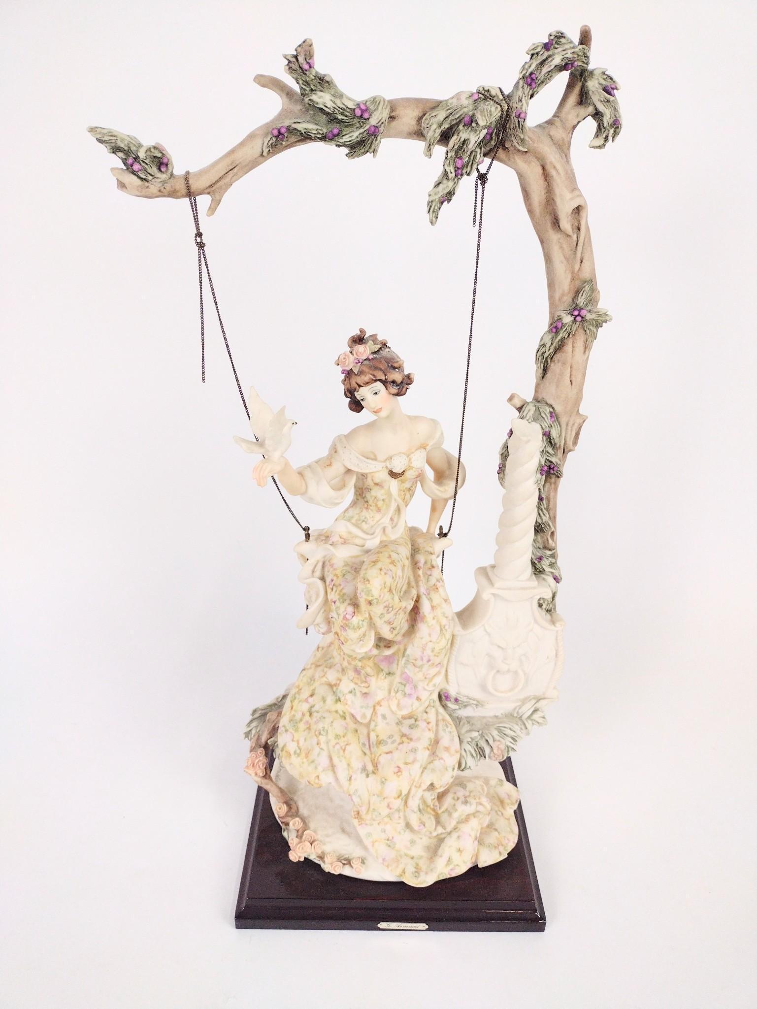 Giuseppe Armani Woman On Tree Swing Figurine: 8" wide X 8" deep X 21" high. EL IMPORTANT: Before bidding, please read the terms and conditions. When you registered for the auction you agreed to these terms and will be required to comply with them