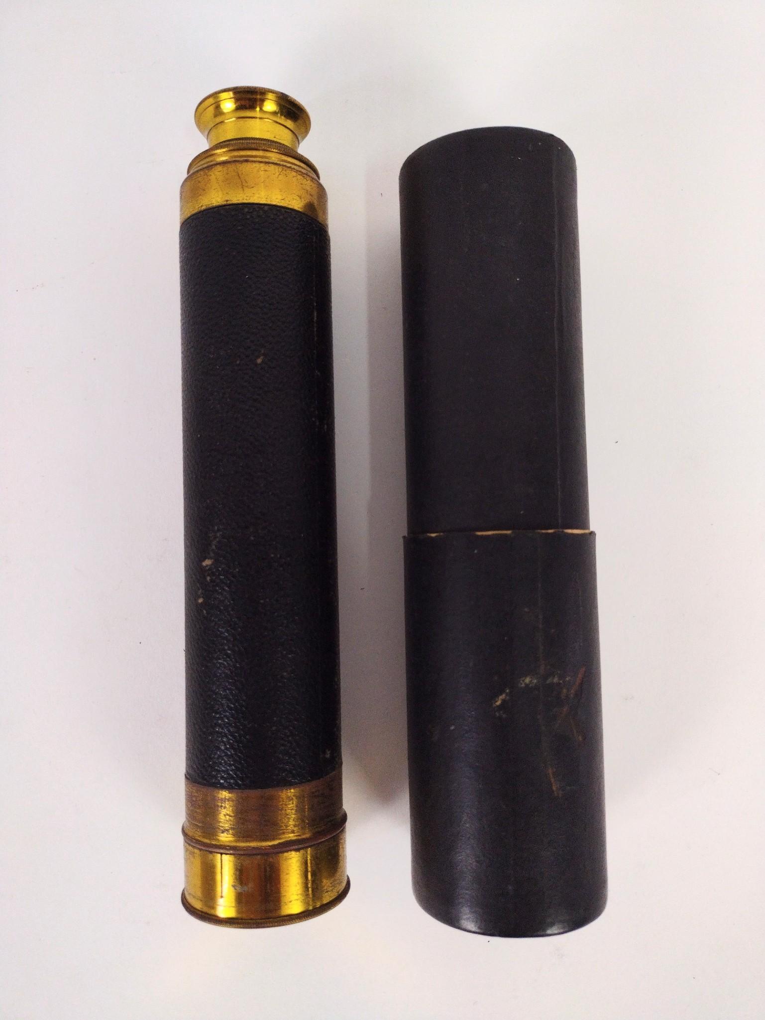 French Leather Wrapped Pocket Telescope: 8" to 23" long. EL IMPORTANT: Before bidding, please read the terms and conditions. When you registered for the auction you agreed to these terms and will be required to comply with them.