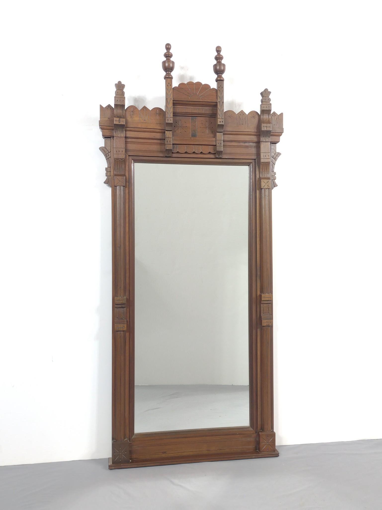 Carved Wall Mirror: 27" wide X 3" deep X 60" high. MG. IMPORTANT: Before bidding, please read the terms and conditions. When you registered for the auction you agreed to these terms and will be required to comply with th