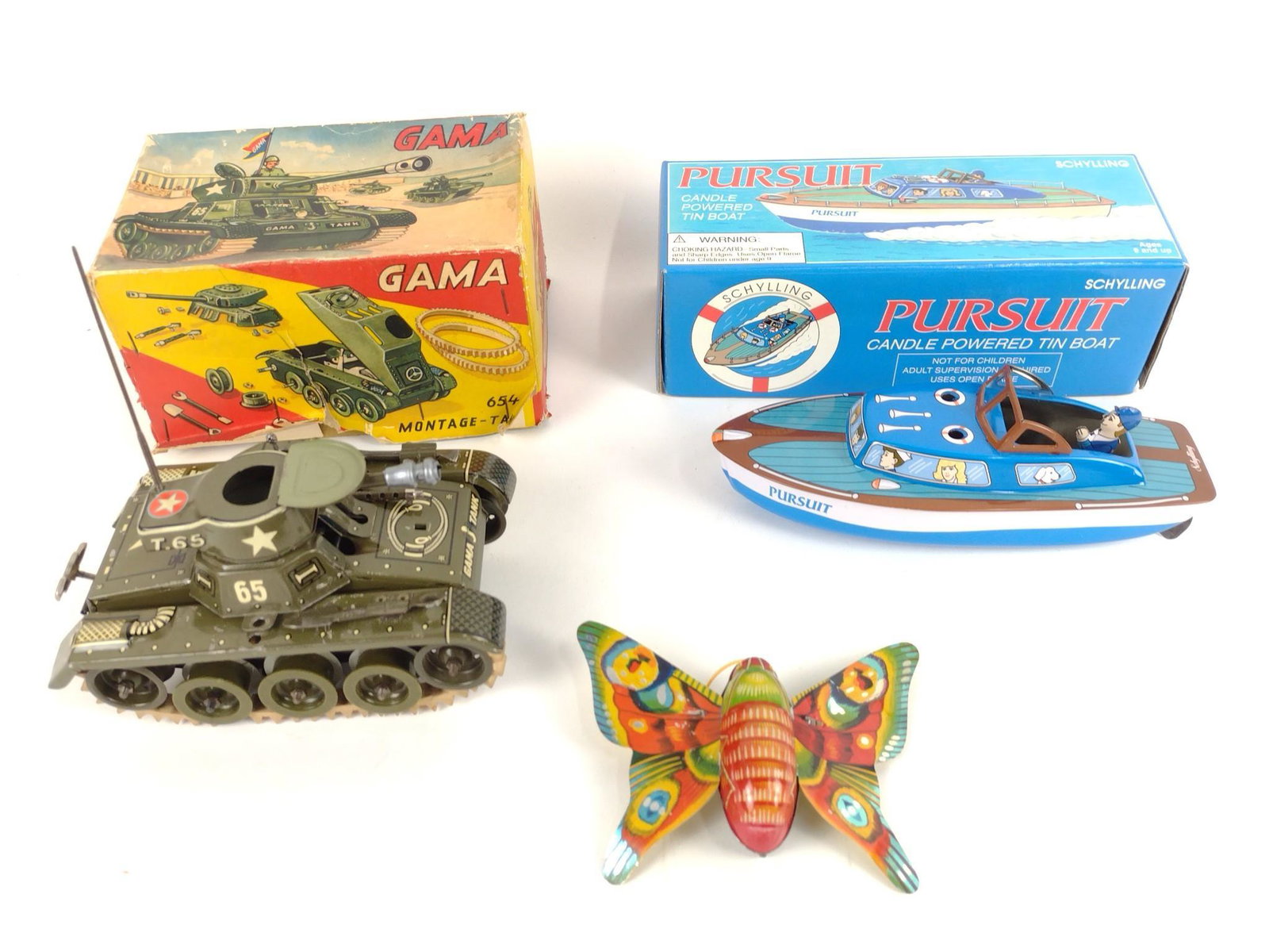3 Tin Litho Gama Montage Tank: Also includes pursuit boat and butterfly. MG. IMPORTANT: Before bidding, please read the terms and conditions. When you registered for the auction you agreed to these terms and will be required to com