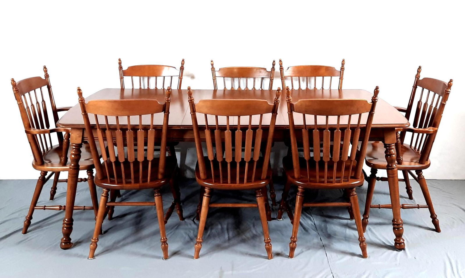 Tell City Chair Co Table with 8 Chairs and 2 Leaves: Table: 68" wide x 39" deep x 29-1/2" high. Table leaves (2): 11-1/2" wide. Arm Chairs (2): 24" wide x 17-1/2" deep x 38" high. Side chairs (6): 18" wide x 17" deep x 38" high. LR IMPORTANT: Before bid