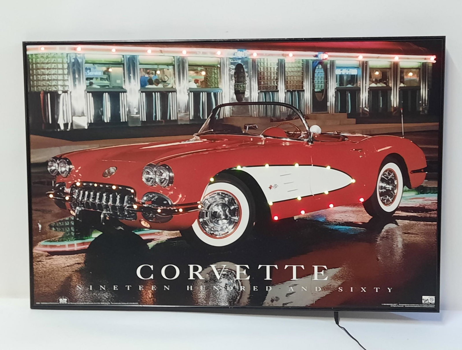 1960 Corvette Print with Lights: Working. Overall with frame 23-1/4" high x 35-1/2" wide. Copyright 1994 by Machine Age. IMPORTANT: Before bidding, please read the terms and conditions. When you registered for the auction you agreed 