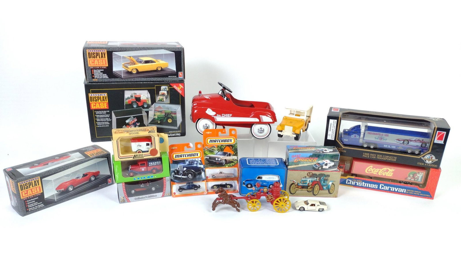 18 Toy Cars and Die Cast Models incl Hubley: 2-2/4" to 13" long. Also includes empty cases. BC IMPORTANT: Before bidding, please read the terms and conditions. When you registered for the auction you agreed to these terms and will be required to