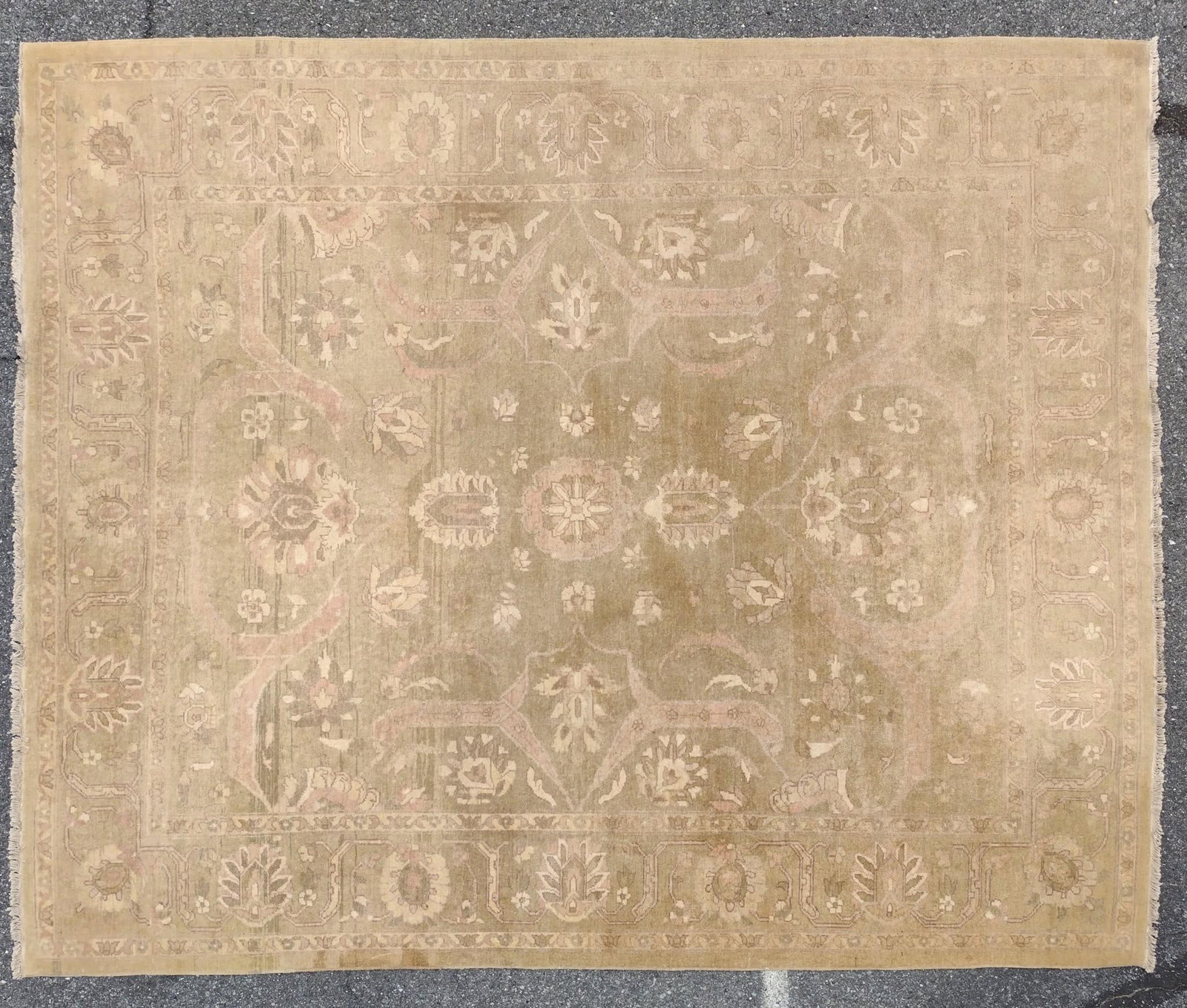 Pakistan Chobi Room Size Rug: Hand woven. Circa 1990s. All-Over design set in a beige field with light cream highlights. 9'9" long X 8'2" wide. Has some sun fading. MG.