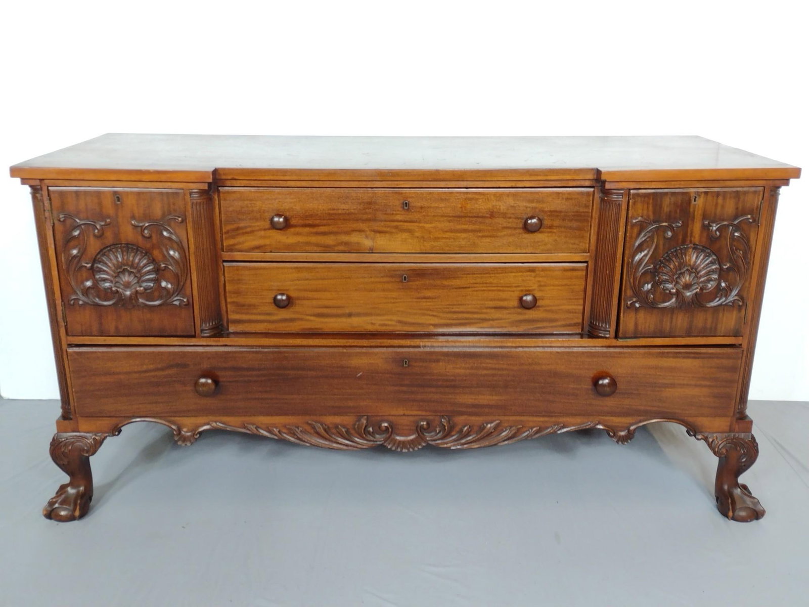 Victorian Sideboard: 72" wide X 26" deep X 36-1/2" high. Has some scratches. Bottom drawer has warp and will not close the whole way. Left Cabinet door has damage to hinge. MG.