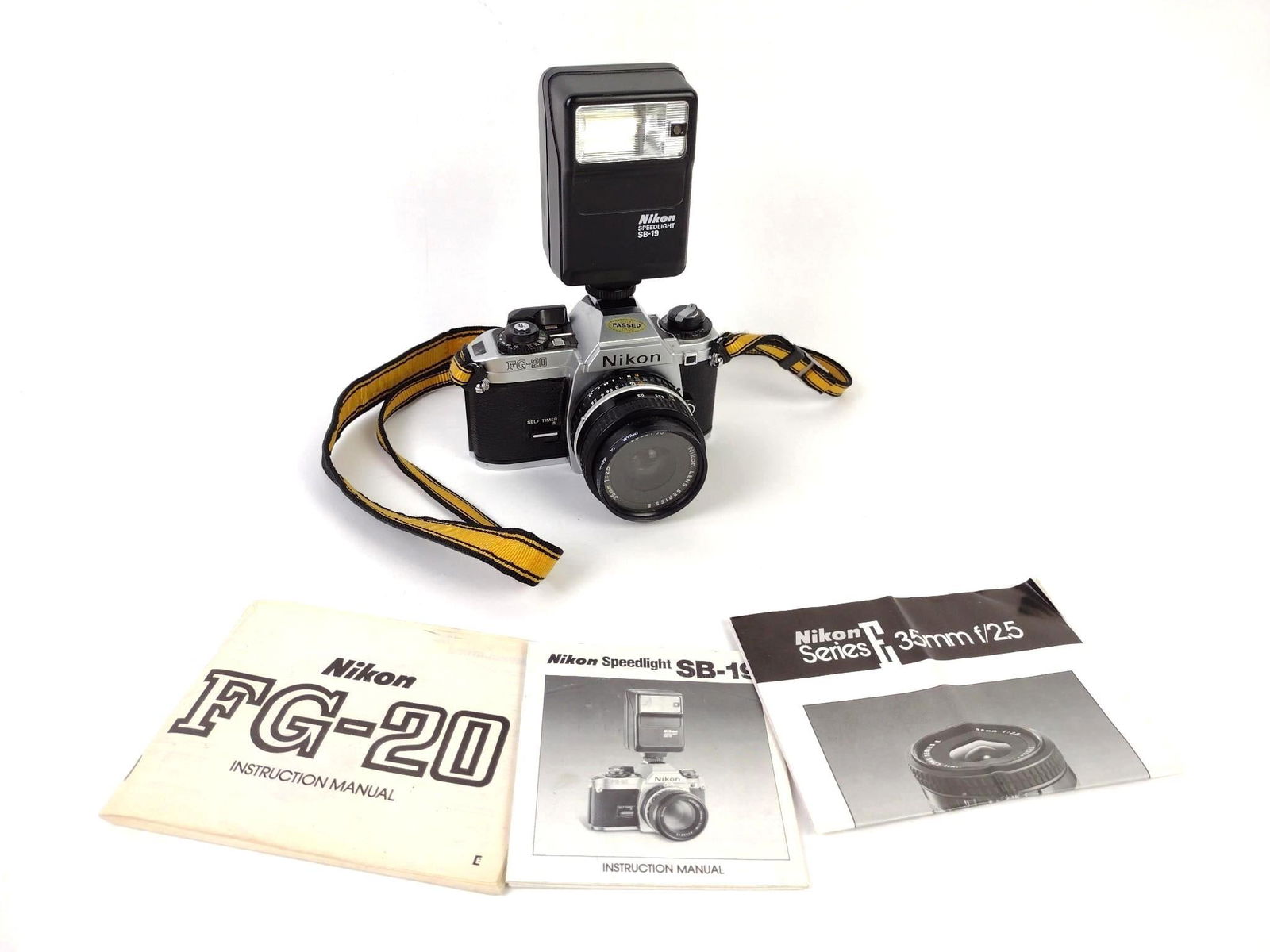 Nikon FG-20 Camera w/ SB-19 Speedlight & 35mm f/2.5: All have leather cases. MG.