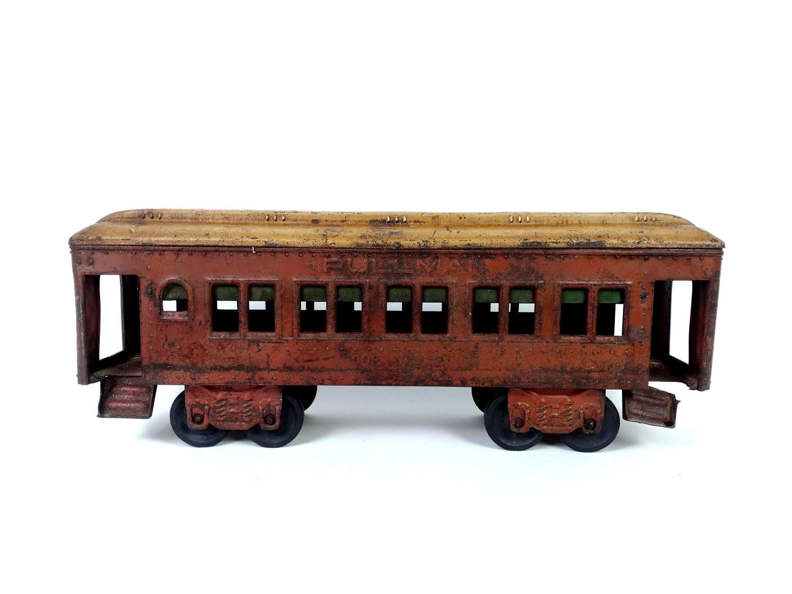 Metal Pullman Passenger Car: 6" wide x 23-1/2" long x 9" high. Some paint loss and rusting.