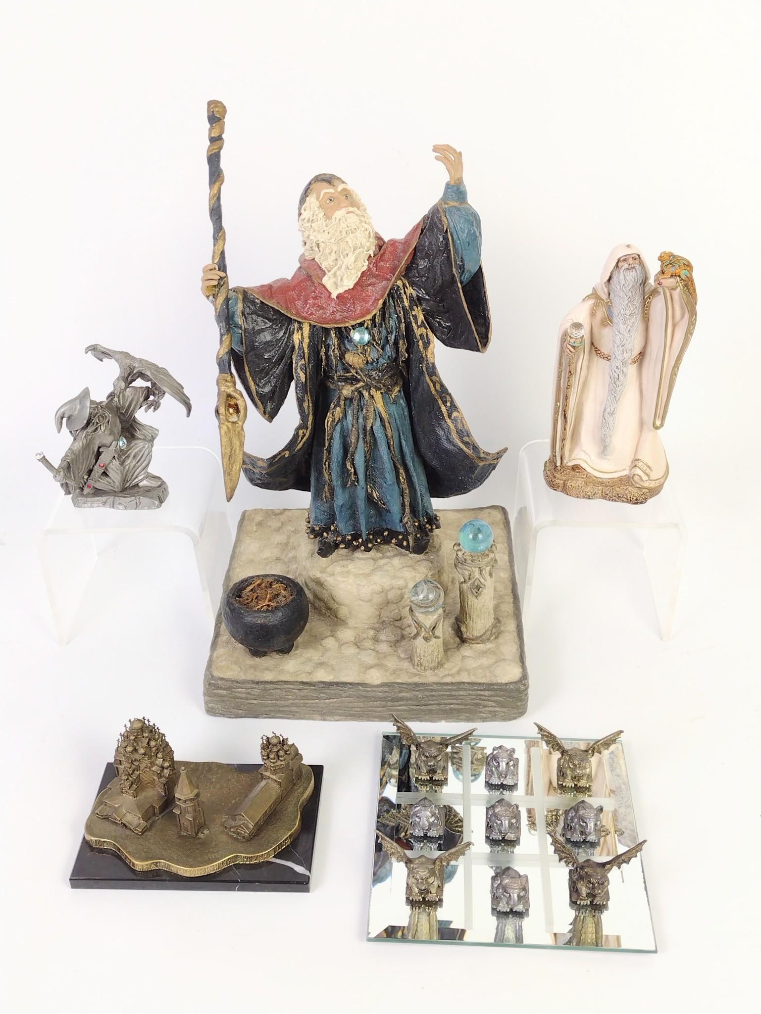 13 Wizards and Gargoyles: Larger wizard signed. 1-1/2" to 12" high. Spear reattached and missing object in left hand.