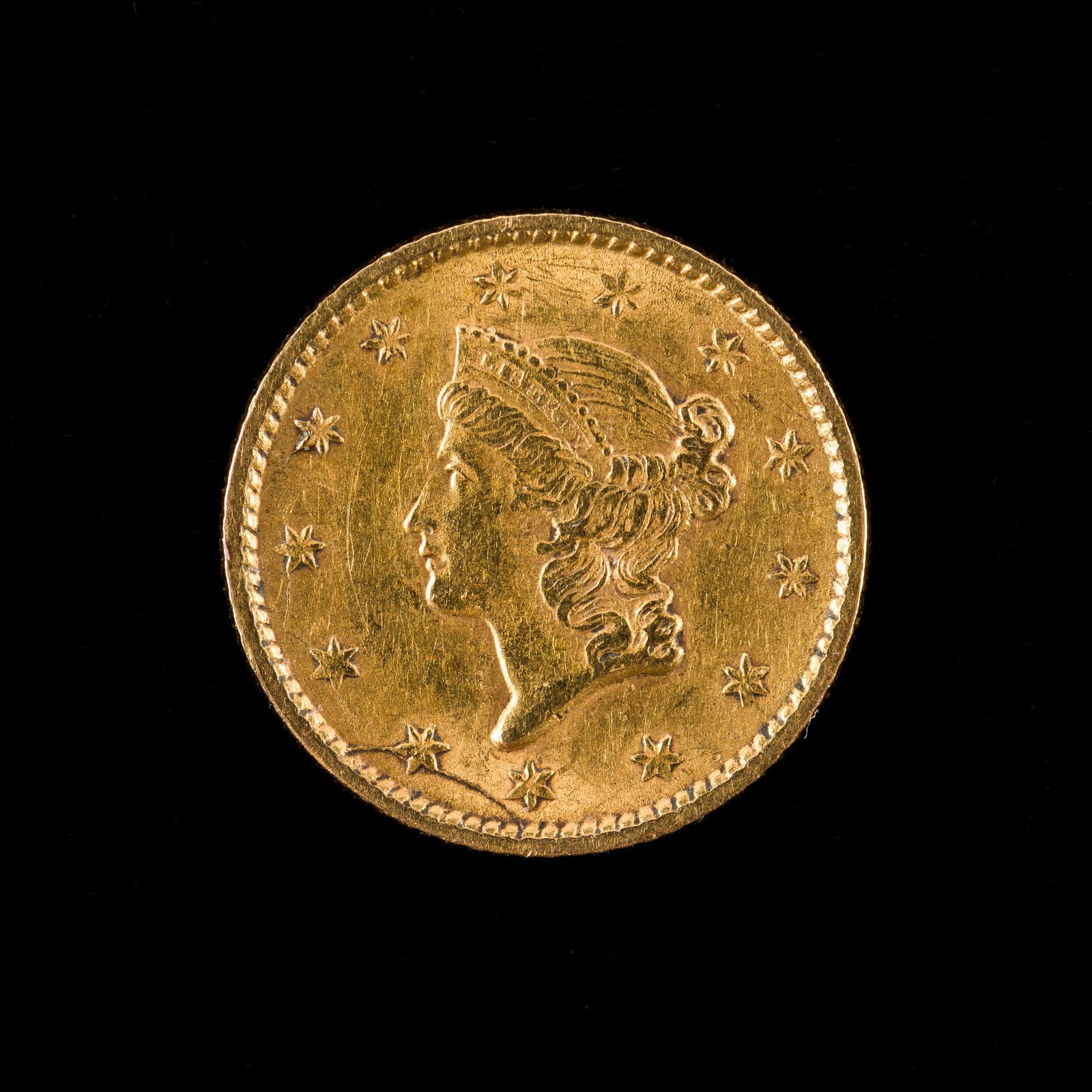 1853 Liberty Head Gold Dollar - With Die Crack (1 of 2)