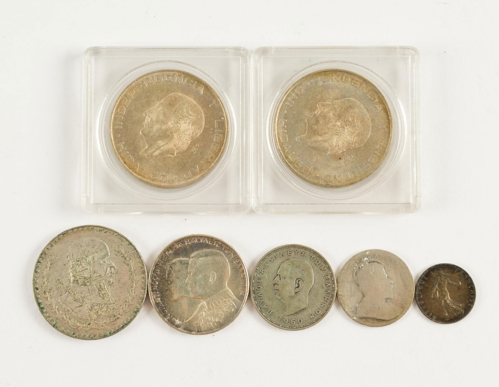 7 Pcs. Foreign Silver Incl. Pesos (1 of 2)