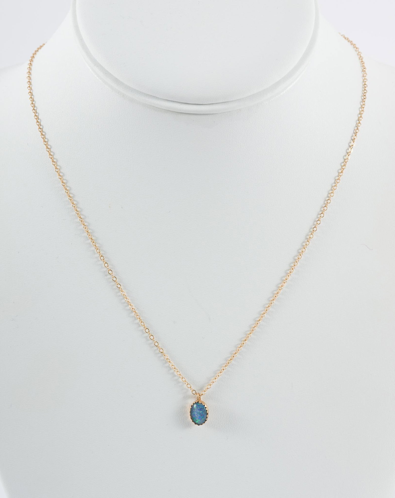 14k Gold Necklace With Pendant: Chain 17" long. Pendant 1/4" long. Chain marked 14k. 1.1 total dwt/1.7 g. AJ.