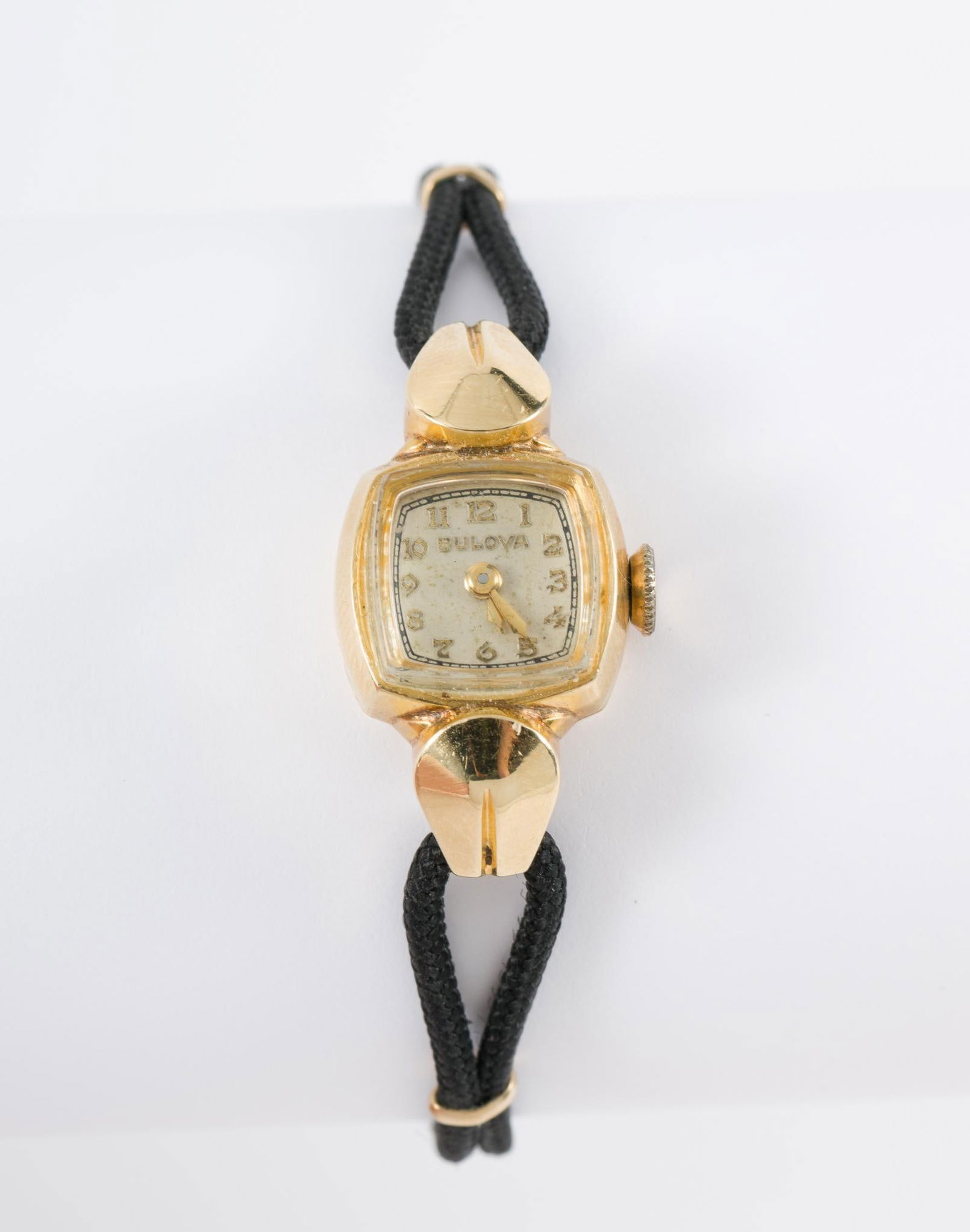 14K Gold Bulova Ladies Wrist Watch: Bulova seventeen jewels wrist watch in marked 14k gold case. 1" lug to lug. Case and crystal weight 3 grams. Running. EK