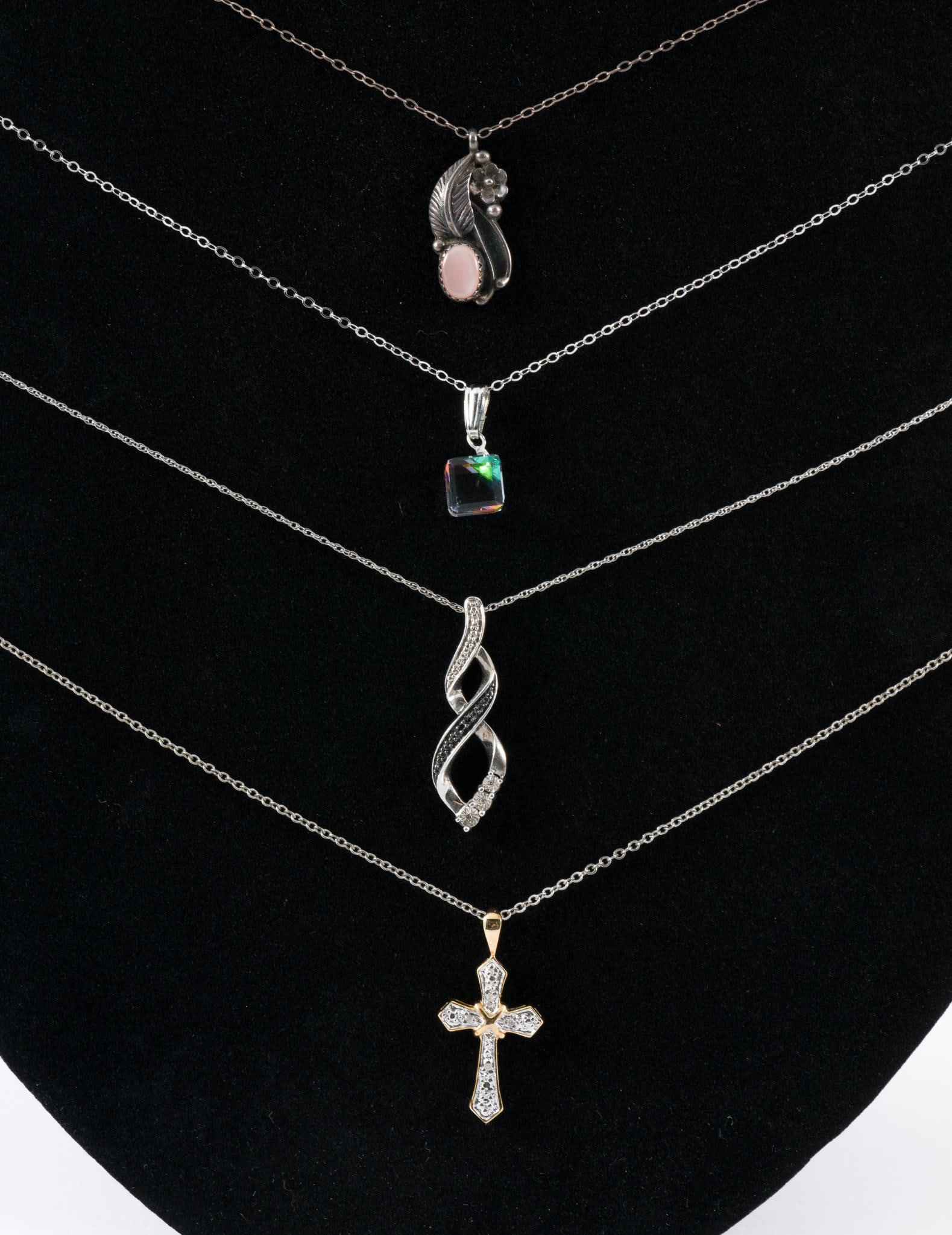 4 Sterling Necklaces With Pendants: Chains 16-17" long. All but floral pendant marked sterling. Pendants 1/4" to 1-1/4" long. AJ.