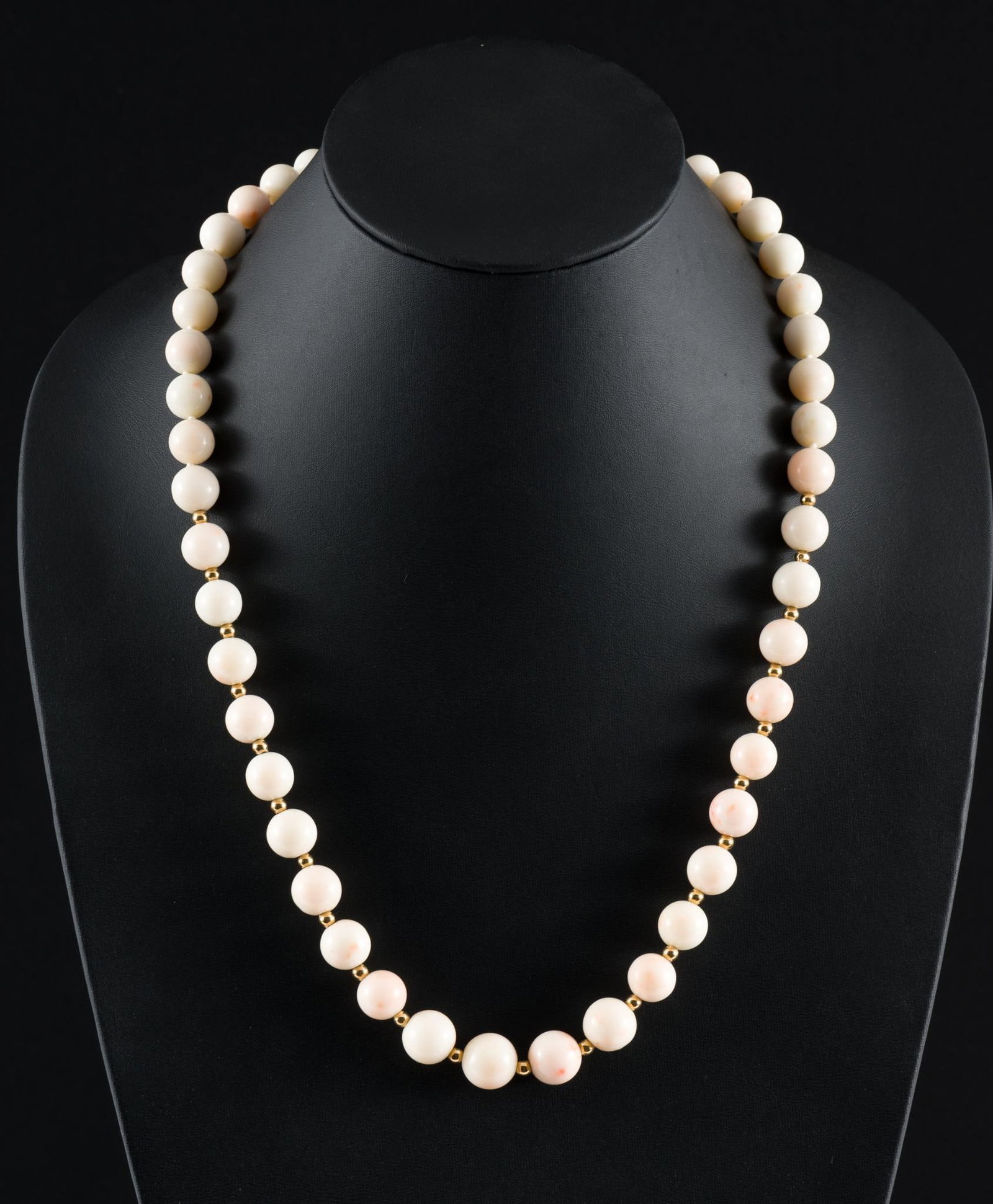 Angel Skin Coral Bead Necklace: 25" long. Beads 1/4" to 1/2" wide. AJ.