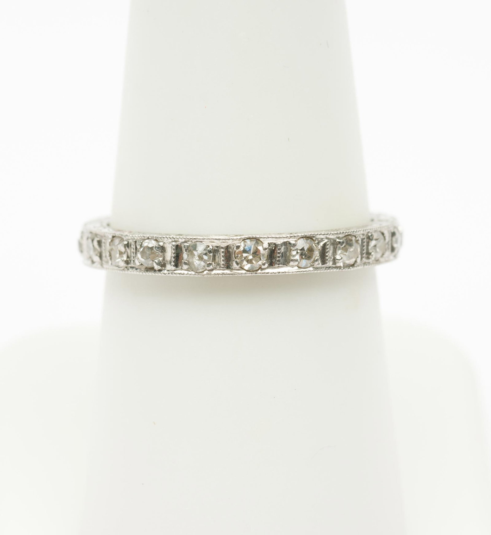Antique Platinum & .63 CTW Diamond Band: Tested platinum band ring set with twenty-one .03 carat each round single cut diamonds. Size 7.5. 2.1 dwt / 3.2 grams. AJ/EK