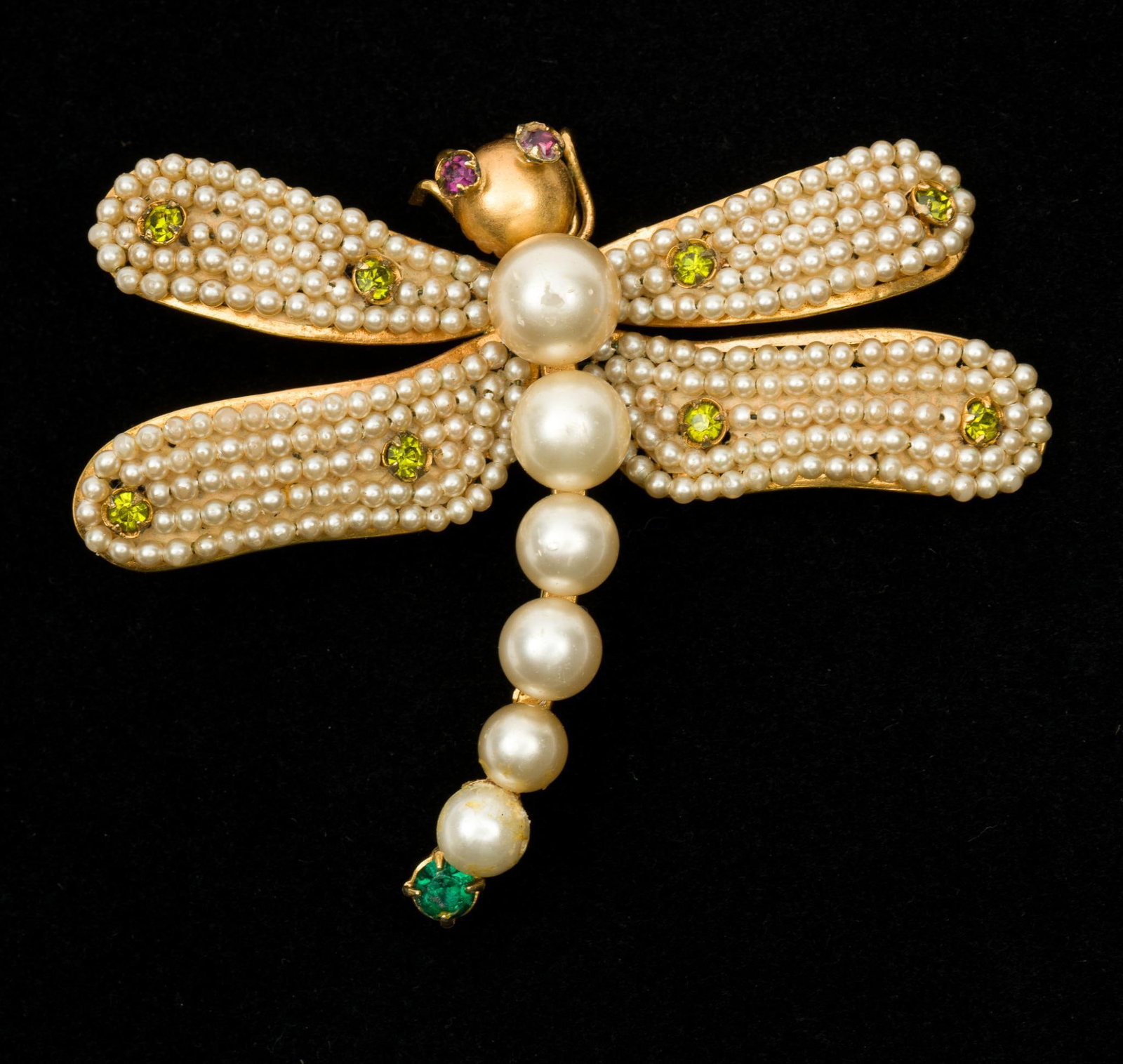 White And Gold-Colored Dragonfly Brooch: 2-1/4" high x 2-3/4" wide. Light scuffing and wear. AJ.