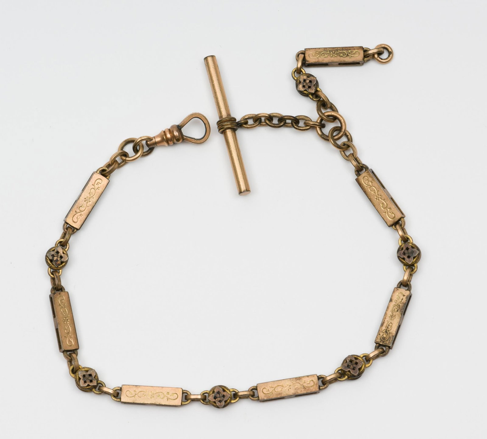 Victorian Gold Filled Watch Chain: 11" long. Overall nicely preserved, with wear to gold. AJ.