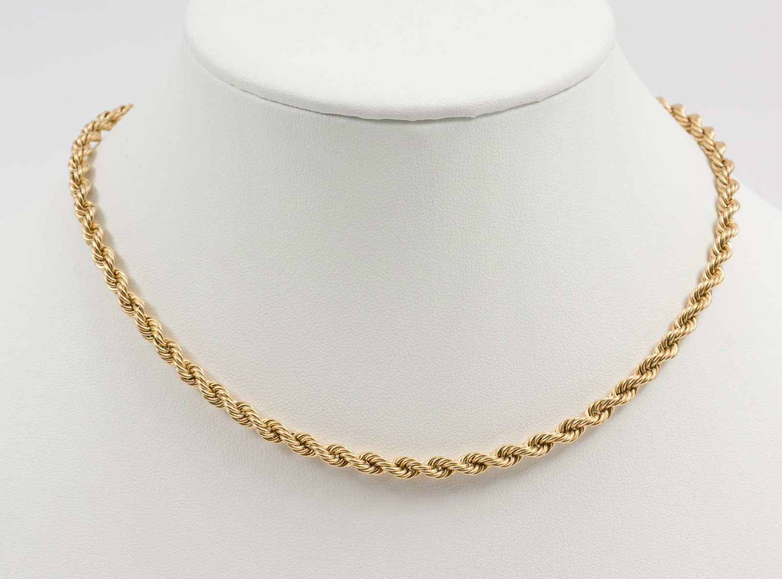 14K Gold Chain: 14k gold rope chain. Marked 14k. 15" long. 6.5 dwt/10.1 g. AJ.