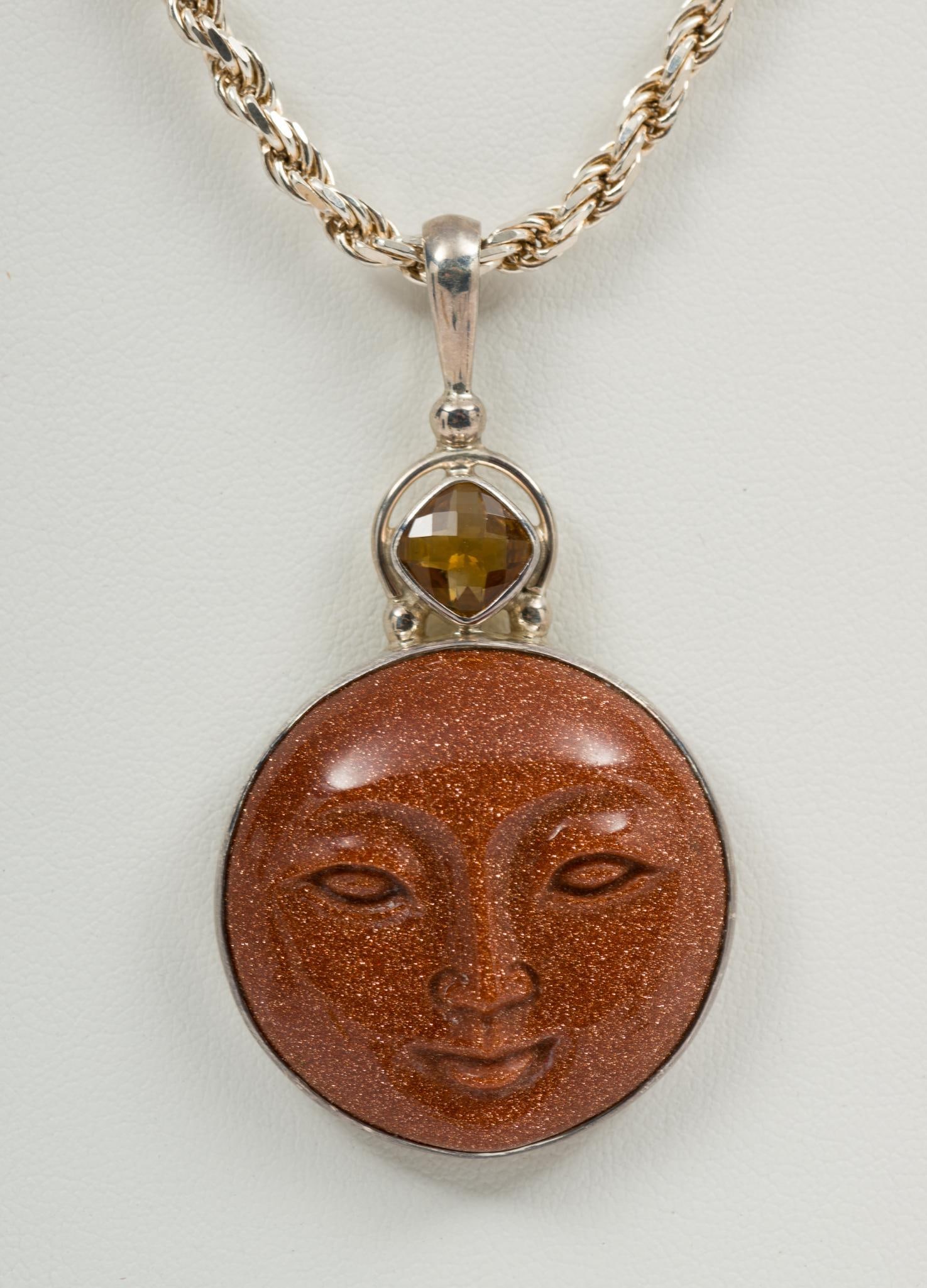 Sajen Goldstone Moonface Sterling Pendant Necklace: Marked 925, signed Sajen. 2-1/2" pendant on 22" sterling rope chain. MH.