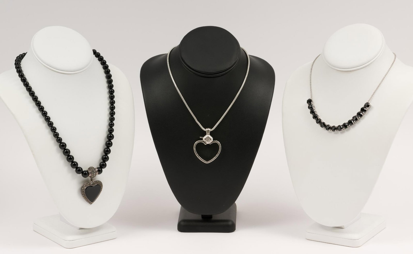 3 Sterling Fashion Necklaces: Black spinel necklace 16" long with 3" extender. Onyx bead necklace 2" long on 20" strand. MH.