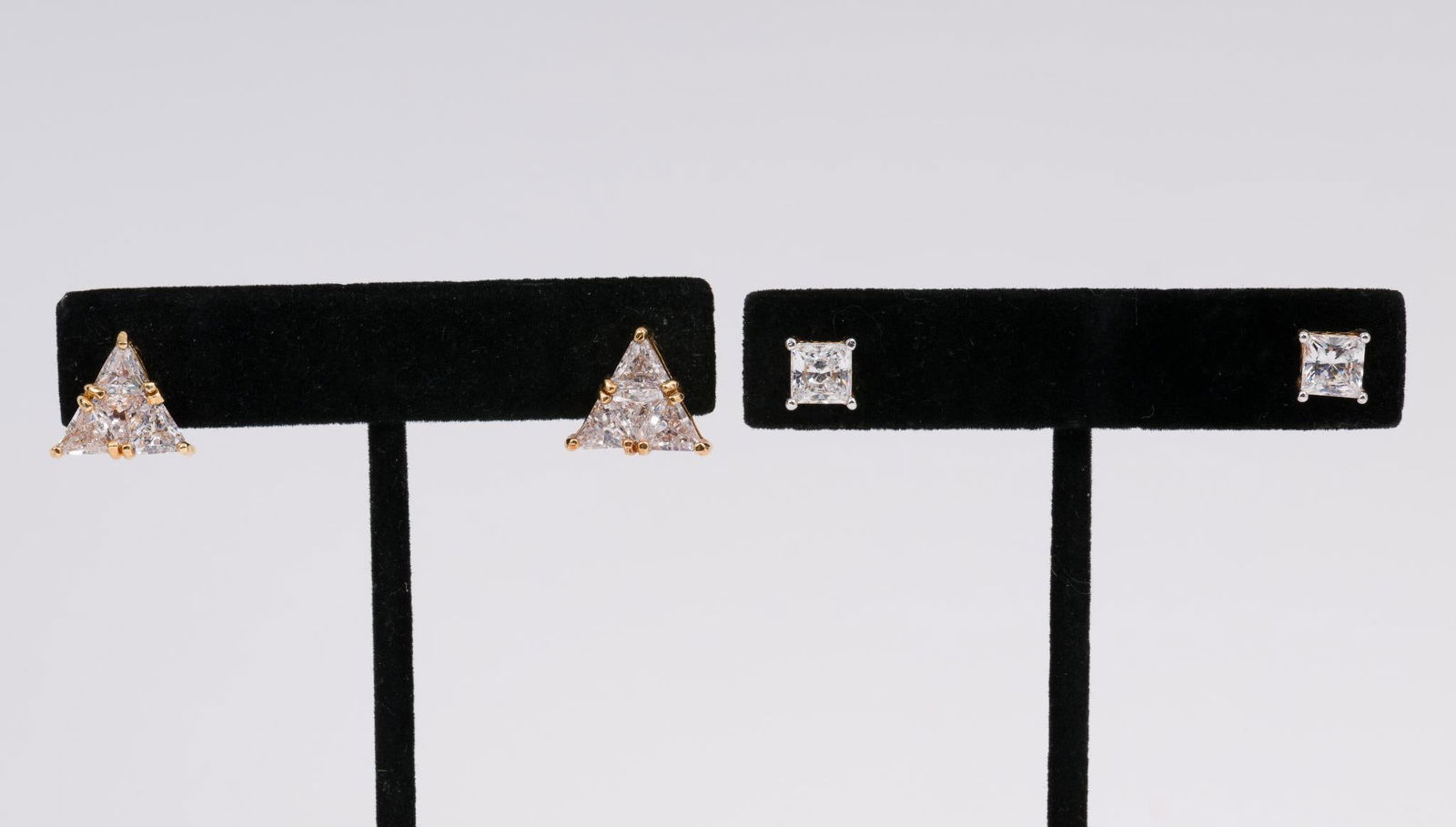 2 Pairs Sterling and CZ Earrings: Marked. 3/8" and 1/2" long. MH.