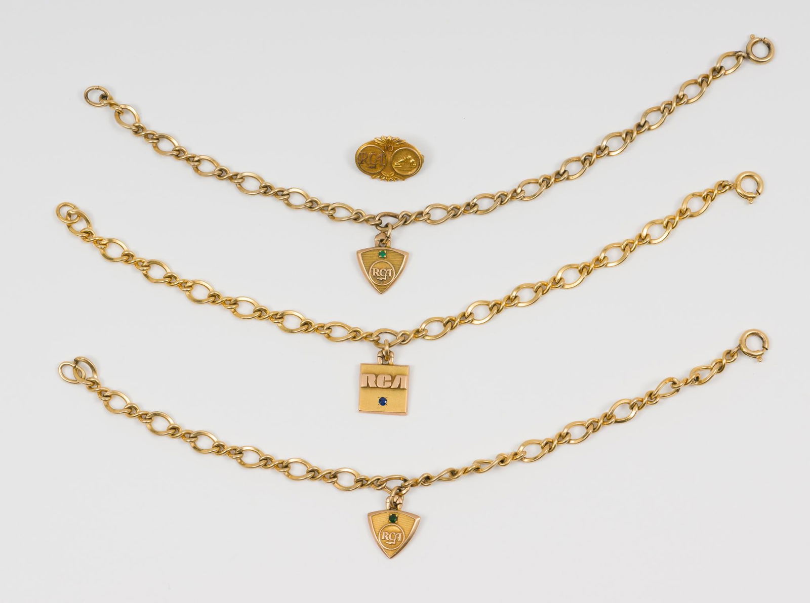 3 10K RCA Charms and Pin (1 of 7)