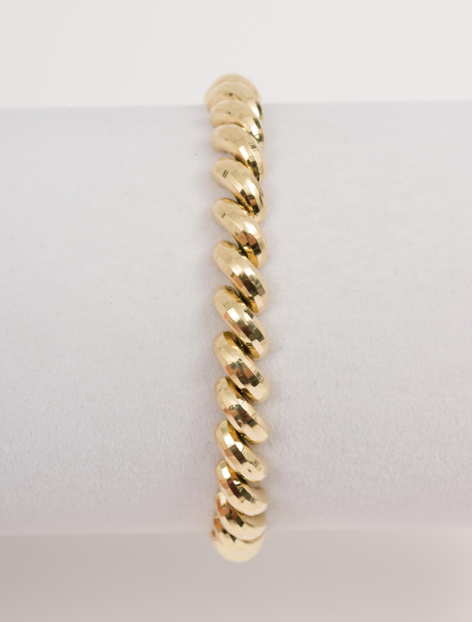 14k Gold Bracelet: Marked 14k on clasp. 7" long. 8.6 dwt/13.4 g. AJ.