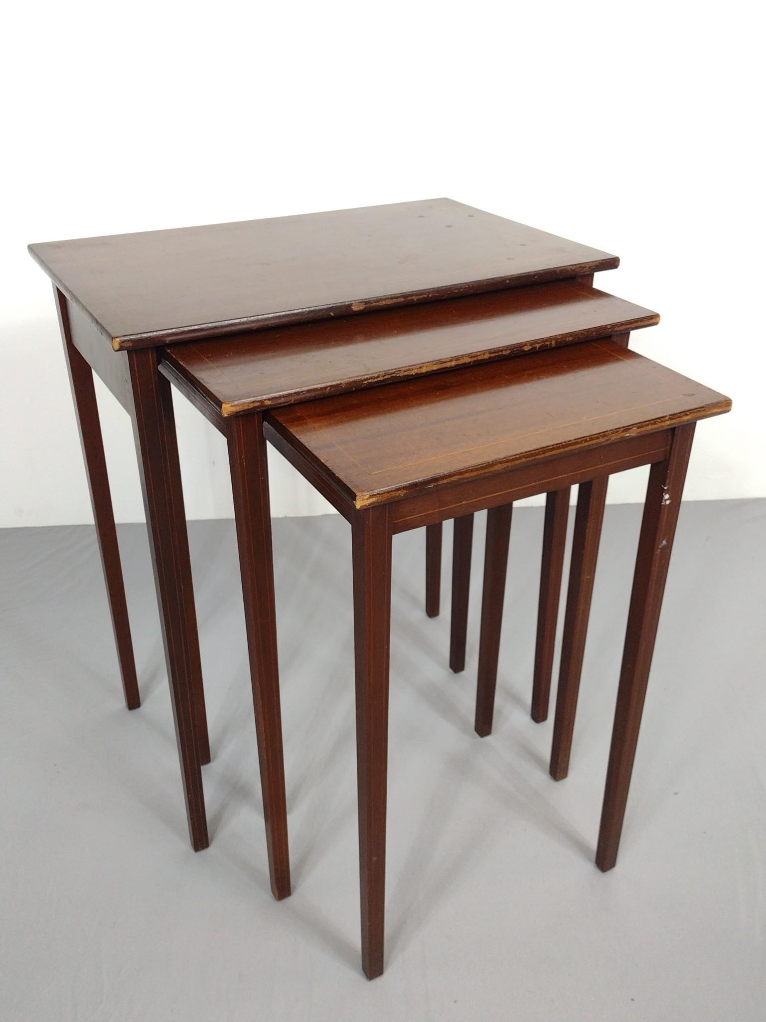 3 Nesting Tables: Large 24" wide X 16" deep X 28' high. Small 16" wide X 14" deep X 25-1/2" high. All have some light scratches and areas of finish loss. MG.