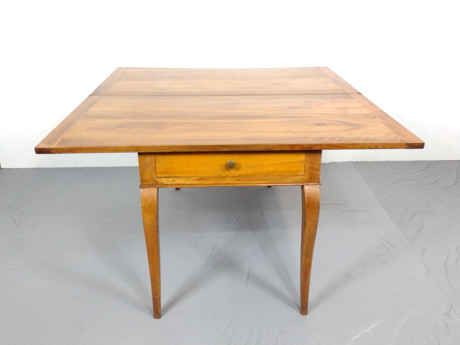 Extension Dining Table: Open 57" wide X 52-1/2" deep X 30-3/4" high. Closed 52-1/4" wide X 28-1/4" deep X 31-1/2" high. Has a few scratches. MG.