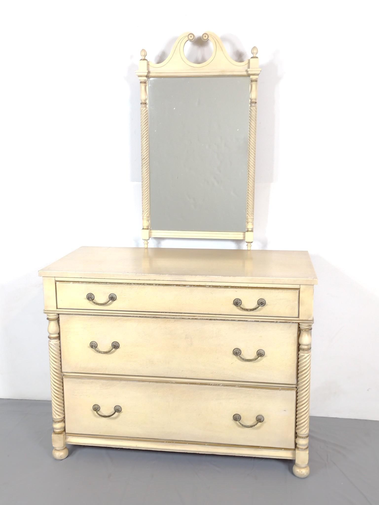 Three Drawer Chest With Wall Mirror: Dresser 46" wide X 22" deep X 35" high. Wall Mirror 23-1/2" wide X 2-1/2" deep X 41" high. Both have some scratches and finish loss. MG