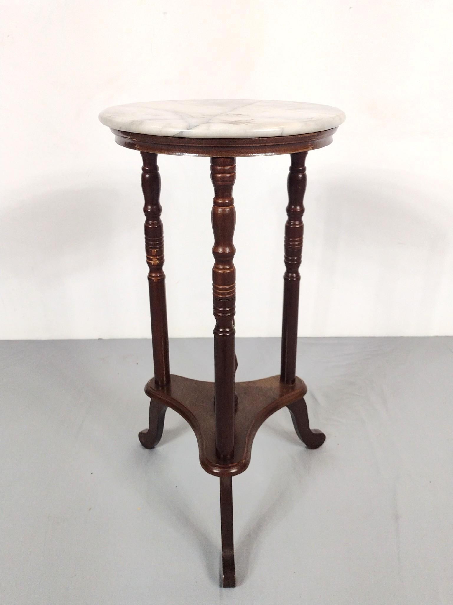 Round Marble Top Table: 13-3/4" diameter X 27-1/2" high. Has some finish loss. No manufactures name found. MG.