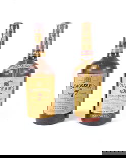 2 - 1 Gallon Seagram's Whiskey Display Bottles: Bottles are empty and for display only. Each 6" diameter x 18-1/2" high. LR / BA