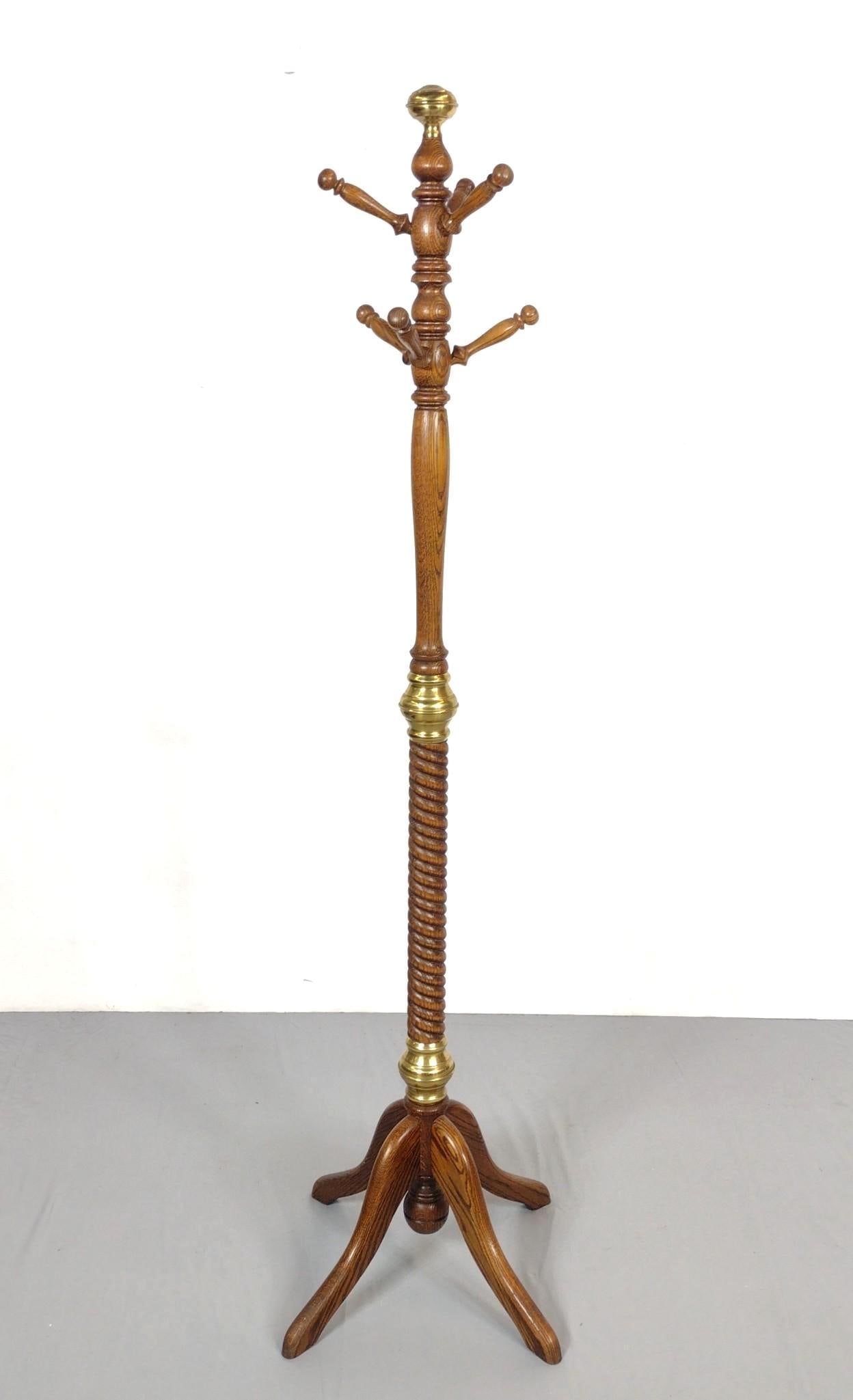 Coat Tree with Brass Mounts: 16" wide X 16" deep X 69" high. Has some light scratches. MG.